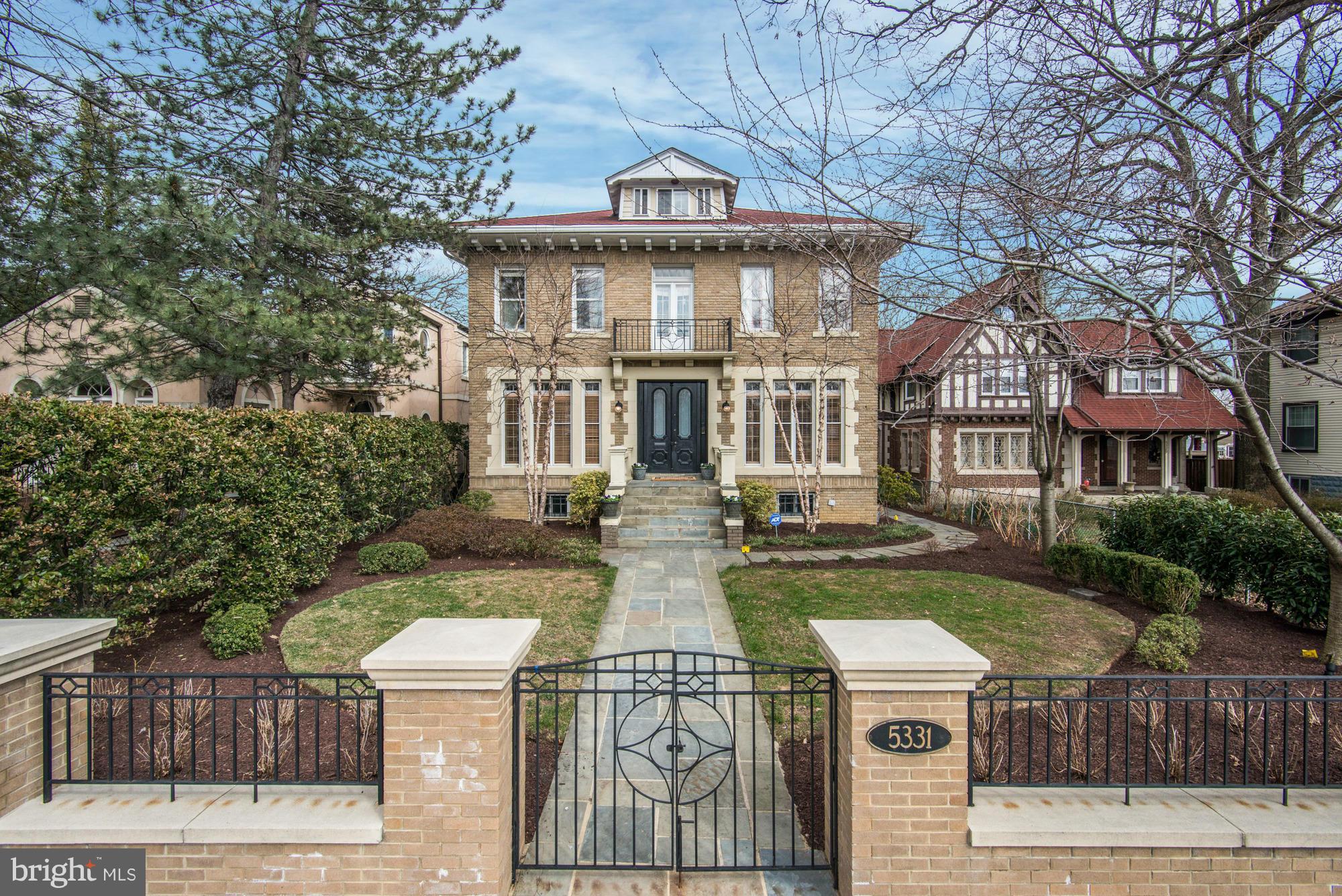 Stunning 1920s Brick Residence on large, professionally landscaped & hardscaped lot w/ parking for 4 cars. 4800SF +/- flrpln feat many areas for formal ent & family living. Lux private quarters include Owner Suite w/gorgeous Bath, 4 addt Brms & 2.5 addt Bas. 2nd Lev Sun Room. LL w/ Fam Rm & large Kitchen sized entertaining Wet Bar to service gatherings & al fresco entertaining.