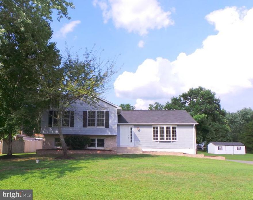 Looking for lots of square footage in a quiet community and NO HOA's? Here you go!! Move right into this Very Nice Split level home situated on almost an 1/2 Acre and offers over 2300 square feet of living space. 4 Bedrooms, 3 Full Baths. Huge Deck off kitchen has new floorboards and is the perfect size for entertaining in partially fenced big backyard with a shed! A fully finished walk-out lower level with a bedroom and full bathroom plus a finished Basement with utility room. New Sump-pump Paint, Carpet, upgraded smoke detectors, and almost new dishwasher! This home just keeps going!! Close to shopping and schools in quiet community.