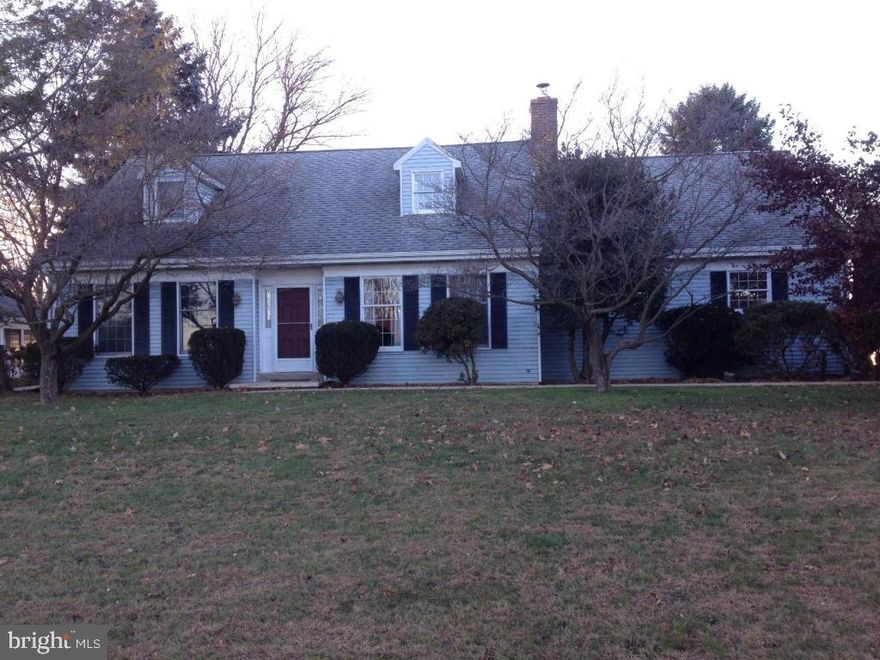 Conveniently located Cape Cod in a lovely, quiet neighborhood.   Large flat lot, covered brick patio, wood stove on main level.  Spacious bedrooms; two bdrms on 1st floor, two bdrms on 2nd floor.  Two full baths featuring newly installed tub.  Attached two-car garage, featuring main level laundry.  Even more living space in the basement, upgraded & renovated in 2012.  Walk-in storage over garage.