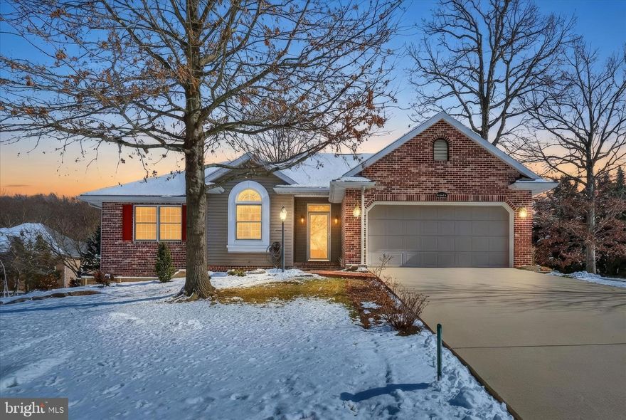 Located in the award-winning Penn National Golf Course Community, this beautifully updated 4-bedroom, 3-bath ranch home offers approximately 1,921 finished square feet of thoughtfully designed living space.

The main level features soaring vaulted ceilings, a cozy gas fireplace, skylights, abundant natural light, and brand-new flooring throughout. The open-concept layout flows seamlessly between the living room, formal dining area, and kitchen—ideal for everyday living and entertaining.

The brand-new kitchen showcases leathered quartz countertops, ample cabinetry, lovely backsplash, and space for casual dining. A convenient laundry room just off the kitchen includes a new washer, dryer, sink, and additional cabinetry.

The spacious primary suite offers a large walk-in closet, an additional closet, and a spa-like en-suite bath with soaking tub, new tile shower, and private water closet. Two additional generously sized bedrooms and an updated full bath with new shower complete the main level.

The finished lower level provides exceptional flexibility with a fourth bedroom, third full bath, kitchenette, workshop, and plenty of space for a home office, gym, or media room.

Outside, enjoy a fenced backyard, attractive landscaping, and room to relax or entertain. A new roof was installed in 2020. Radon mitigation system. 

Community amenities include 36 holes of 4-star golf, outdoor pool, tennis and pickleball courts, yoga, community garden, 40+ social clubs, on-site restaurant and bar, and more—resort-style living at its best!