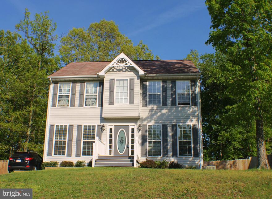 Back on the market-This light filled 3 bdrm,2 bath Colonial home features a beautiful kitchen w/ granite counters,upgraded lighting, cabinets,deep sink, stainless steel appliances, Formal dining rm & liv.rm.2-story foyer. Gas fireplace, large 2-tier deck, fenced in back yard. Lg Master bdrm,double sink vanity,walk-in closet.New HVAC & Hot Water Heater.Close to shopping, schools, I-95