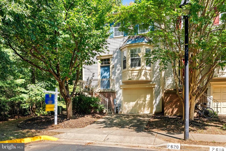 A MUST SEE!!! Welcome to this beautiful end-of-group townhome offering a perfect blend of style, comfort, functionality and privacy. Nestled at the end of Windy Oak Court - no homes directly across the street AND backs up to a golf club -  this home offers the unique advantage of a townhome community with added tranquility and seclusion. Step into a bright and open main level featuring gleaming bamboo hardwood floors and a spacious layout ideal for everyday living and entertaining. A convenient powder room adds to the functionality, while the gourmet kitchen boasts stainless steel appliances, granite countertops, and ample cabinetry for all your storage needs - plus room for a nice sized table. The living room offers a warm and welcoming atmosphere with a cozy gas fireplace and double doors leading to a private deck—ideal for relaxing or entertaining outdoors. Upstairs, you'll find three generously sized bedrooms and two full bathrooms, including a primary suite with excellent closet space and abundant natural light. The finished lower level provides even more living space, featuring plush carpeting and walk-out access to a private patio—perfect for a family room, home office, gym, or even guest quarters.

With modern finishes, a versatile layout, and a sought-after end-unit location, this townhome is ready to welcome its new owners. Don’t miss your chance to enjoy this home! Community golf, pool and tennis courts available (membership is optional with a fee)