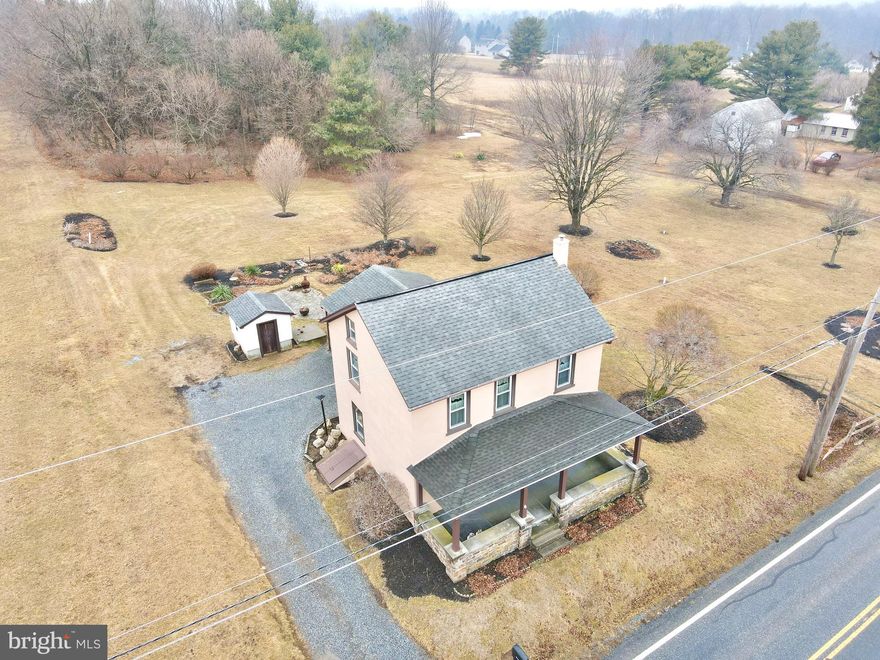 Welcome to this charming 3-bedroom, 1-bath farmhouse nestled in Brandywine Heights School District and Rockland Township. Sitting on a picturesque 6.11 acres, this property offers a perfect blend of tranquility and convenience, ideal for those seeking a peaceful rural setting with plenty of space to roam.  Outside you'll be enamored by some of the 19th century stone-work.  Step inside to discover the perfect blend of 19th century charm, and 21st century luxury.  An updated kitchen, features modern finishes, including a stainless appliances and a dishwasher, along with ample storage, including a large party.  Perfect for cooking and baking! A private dining room, and cozy living room round out the first floor.  Upstairs, you'll find the homes 3 bedrooms, and a renovated, handicap accessible bathroom.  The third floor offers a large and spacious attic.  Throughout the home you'll notice the deep windowsills, reminiscent of the 1800's, along with the new, updated, vinyl windows, for better energy efficiency.  The basement provides a spacious area for storage, and houses the home's mechanicals, including two water heaters, a water softener, laundry, an updated 200 amp electric panel, and the boiler.  With 6.11 acres of land, there's plenty of room for outdoor activities, gardening, or even potential expansion.  A 2-car attached carport can be found off the back of the home.  This could potentially be converted into a future garage, or family room.  In the spring, summer and fall the gardens are in full bloom, and are breathtaking.  A shed provides additional storage for outdoor tools and equipment.  Whether you're looking to create your own private oasis or enjoy the natural beauty that surrounds you, this home provides endless possibilities.  Don’t miss your chance to own this retreat. Schedule your showing today before this on too is gone!