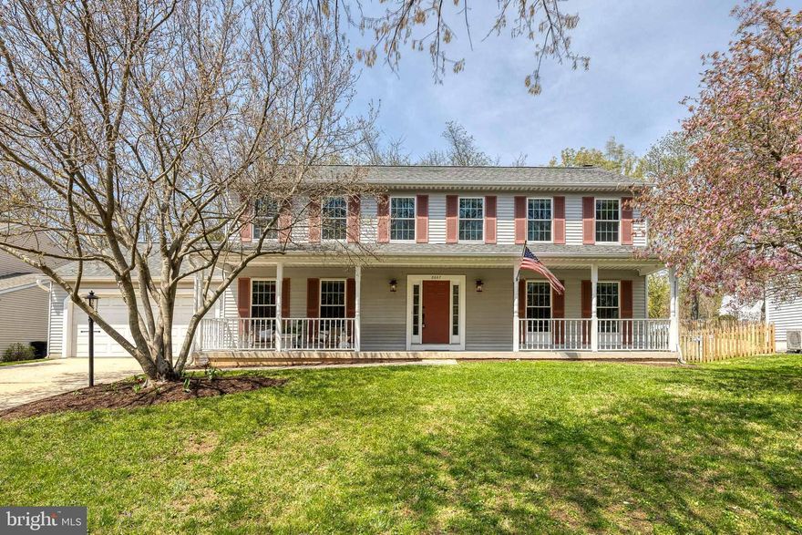 **HIGHEST AND BEST OFFERS DUE SATURDAY 4/26 at 10AM**

Welcome to 8667 Open Meadow Way, nestled in the highly sought-after Long Meadow neighborhood with no CPRA fees! This beautifully updated 5-bedroom, 2.5-bath colonial offers 3,300 sq/ft of thoughtfully designed living space across three levels, blending timeless elegance with modern comfort.

A charming covered front porch and landscaped walkway set the tone as you step into the bright hardwood foyer, flanked by formal living and dining rooms with crown molding and rich wood floors. The family room is a cozy retreat with a brick fireplace and a 12-ft sliding glass door that opens to an expansive deck and a fully fenced backyard oasis—perfect for indoor-outdoor living.

The gourmet kitchen is a showstopper with hand-chiseled granite counters, copper farmhouse sink and hood, custom cabinetry, spacious pantry, and high-end stainless steel appliances including a 36” induction cooktop, double wall oven, and built-in mini fridge/wine bar.

Upstairs, the luxurious primary suite boasts vaulted ceilings with skylights, a walk-in closet, and a spa-like en-suite with dual vanities, soaking tub, and a frameless shower with water tile body jets. Four additional bedrooms—including one that connects to the primary—offer space for a nursery or home office. A beautifully remodeled guest bath completes the upper level.

The newly refinished basement adds over 850 sq/ft of entertaining space, featuring LVP flooring, a sleek wet bar, a bonus room with walk-in cedar closet, and a custom laundry room. Rough-ins for a full bath offer future expansion potential.

Additional updates include 40-year architectural roof, Clearview windows, Trane HVAC, heat pump water heater, oversized 2-car garage, and premium tech upgrades including wired ethernet throughout, and a 10-camera Lorex 4K security system.

Don’t miss this exceptional home combining luxury, functionality, and privacy in one of Columbia’s best neighborhoods!