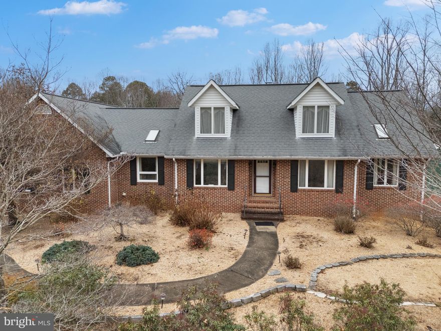 Exceptionally maintained and loved house is looking for a new family to call it home!  Classic Brick Cape Cod style home offering 3 bedrooms with a bonus room, 3 baths,  and a main level primary bedroom.  Main level has formal dining, eat in kitchen opening to the family room.  All situated on a private 3+acre lot.  The paved circular driveway extends to the rear leading to a huge detached Garage designed to store your camper and boat at the same time!  Generac house generator too! Get ready for professional photos but do not delay - set up your showing.  You will not want to miss out on this one!