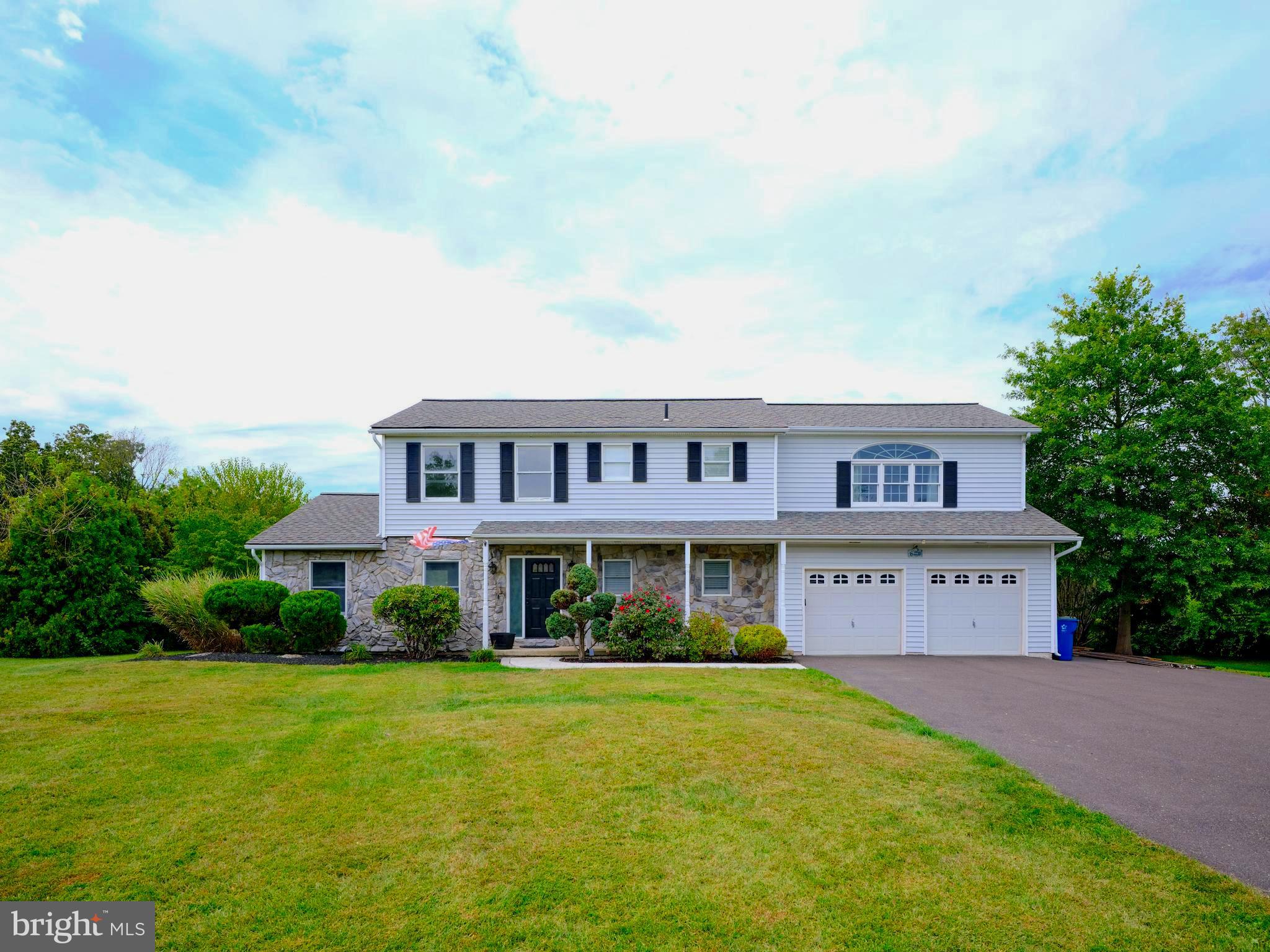 Set on a quiet street just outside of Sellersville this tastefully renovated 4 bed, 2.5 bath colonial with fully finished basement is ready for the next chapter. Enter through the front door to a bright and welcoming open floor plan. The fully updated eat-in kitchen offers an impressive island, custom cabinetry, stainless appliances and tile back splash. There is a large dining room for hosting guests and an open living room area that overlooks the front yard. Step down into the additional four seasons sun room with exposed beams, vaulted ceiling, woodburning fireplace, and sliding doors that open to the expansive deck that overlooks the in-ground pool and private backyard surrounded by a mature landscape. The 2nd floor has an oversized primary bedroom with walk-in closets and cantilever deck. There are three more generous bedrooms and two fully renovated bathrooms.. The finished basement with storage provides additional recreational space. There is an oversized garage with separate attached storage room. Just minutes from routes 313, 309, & 563. An easy drive to Sellersville, Perkasie & Doylestown with easy access to shopping and restaurants. Schedule your tour today!