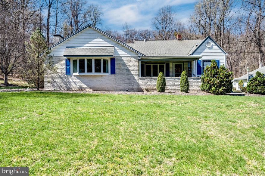 Set amid the peaceful countryside on over 2 acres of beautifully manicured land, this charming Cape Cod-style home offers the perfect blend of comfort, character, and space.  Step inside to discover a custom-designed kitchen featuring Corian countertops, a glass cooktop, and double ovens — ideal for anyone who loves to cook and entertain. A spacious family room with a cozy brick fireplace invites you to relax and unwind.  The primary bedroom provides a tranquil retreat, while two additional bedrooms offer flexibility — including one tucked away upstairs for added privacy. The main floor also includes a laundry room that could easily be converted back into a fourth bedroom if desired.  A true highlight of this home is the stunning sunroom — a massive space perfect for hosting holidays, family gatherings, or simply enjoying the scenic surroundings year-round. With exposed wood beams, an abundance of windows, beautiful tile flooring, and a convenient wet bar, the sunroom is a space you'll never want to leave.  Outdoors, the property continues to impress with a 3-car detached garage, a storage shed, and an additional oversized shed that can accommodate two more vehicles. Summertime will feel like a dream with the in-ground pool, fully fenced with vinyl fencing and accented by a picturesque gazebo.  Lovingly maintained and cared for by its longtime owner, this home offers a rare opportunity to own a slice of country paradise — with all the amenities to enjoy it to the fullest.