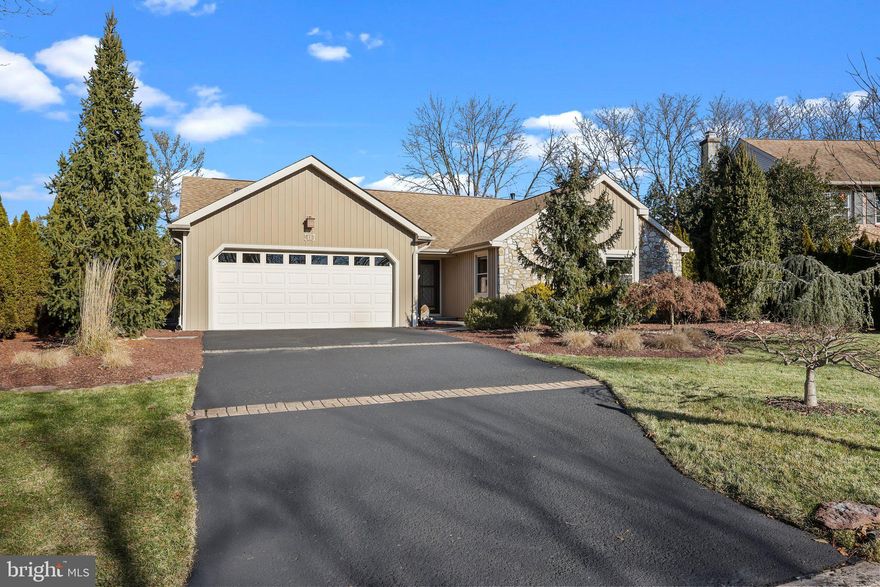 Welcome home to 11 Jasmine Court, first-floor living at its finest on a peaceful cul-de-sac in the heart of bucolic Bucks County. Every square inch of this property has been freshly painted and redefined with both form and function in mind - including newer siding, windows, skylights, and doors. Walk through the front courtyard with custom landscaping and bluestone slate walkway at the inviting covered entry. Gather around the gas fireplace with custom marble surround and inlaid Moravian tile details around the hearth in the great room with natural light pouring through skylights in the vaulted ceiling. Thick crown molding and baseboard continue into the sunny dining area. The bright chef's kitchenoffers updated cabinetry, stainless steel GE appliances, built-in refrigerated wine storage, gas range, center island, instant hot water heater, and skylight with remote control shade. The newly renovated four-season sunroom features a serene sitting area for morning coffee or evening cocktails as the sun sets. Enter the primary bedroom suite through French doors to find a generously-sized bedroom, walk-in closet, and tastefully remodeled bathroom with custom tiled walk-in shower and separate vanities with raised counter height. Two additional bedrooms with large closets and spectacularly wide wooden window sills share a remodeled hallway bathroom. The partially finished daylight basement offers two separate living spaces with custom-lit coffered ceilings. The bone-dry unfinished spaces store the newer HVAC system (2022) with Aprilaire humidifier, new sump pump (2023), new water heater (2023) central vacuum system, French drain, and a fabulous walk-in cedar closet. The newer whole-house generator (2018) offers peace of mind in every season. Back on the main floor, convenient first-floor laundry is located in the mudroom between the kitchen and oversized two-car garage with abundant storage space, coated floor, and track organizer system. The highlight of this home is undoubtedly the beautiful backyard spaces, with sprawling paver patio, grassy lawn, low maintenance perennial garden, and specimen trees, including deep pink redbud trees and white Kousa dogwood blossoms bursting in the spring. The cul-de-sac is within reach of the walking path, connected to the Newtown Trail System. Located in close proximity to Tyler State Park and all that Newtown Borough has to offer, and assigned to award-winning Council Rock North High School - Don’t miss this incredible opportunity!