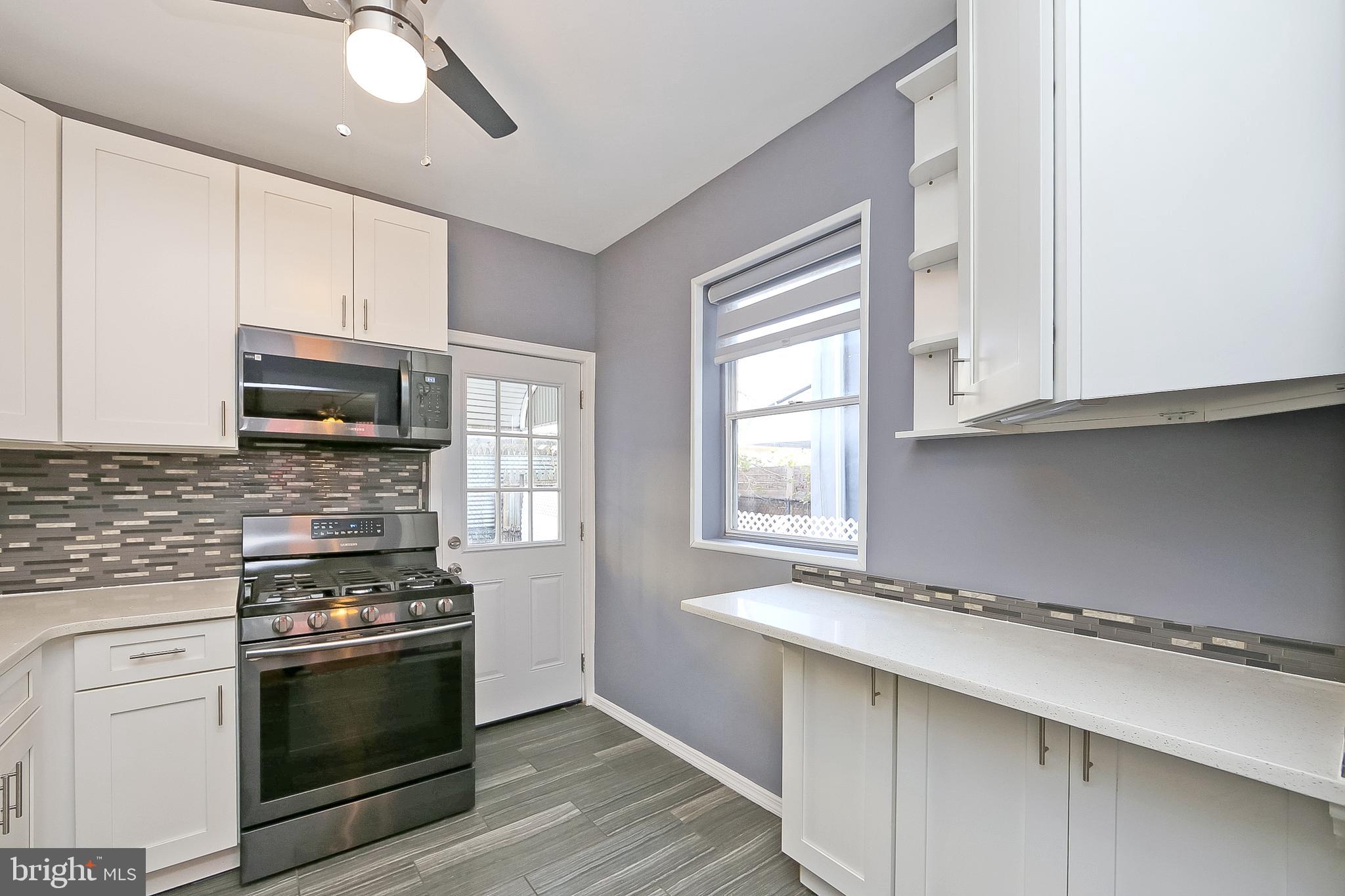 Here's the revised version with expanded details about the closet space:
---
Welcome to this beautifully updated 3-bedroom home in the vibrant Port Richmond neighborhood of Philadelphia. Featuring a range of recent updates, this home combines modern comfort with classic charm.
Step inside to a spacious living room with plenty of natural light, perfect for entertaining or relaxing. The remodeled kitchen is a true highlight, with crisp white cabinets, sleek stainless steel appliances, and Corian counter space—ideal for home cooking and gatherings. The bathroom has been tastefully renovated with contemporary finishes, offering a fresh and clean retreat. Upstairs, you'll find generously sized bedrooms, each offering exceptional closet space to meet all your storage needs. Whether you need room for a wardrobe, extra linens, or seasonal items, these closets provide both functionality and convenience.
The concrete patio at the rear of the home is perfect for outdoor dining, gardening, or enjoying a quiet evening. This home is ideally located, close to shopping, restaurants, and public transportation, making daily errands and commuting a breeze.
Don't miss the chance to make this updated gem your new home in the heart of Port Richmond!