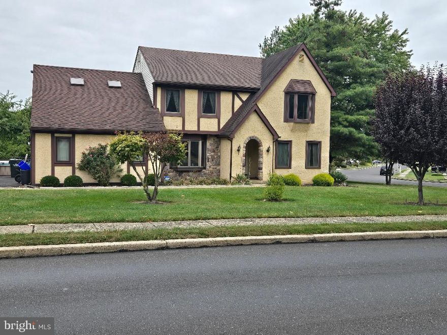 Enter this home into the foyer, large formal dining room with crown molding, living room  also with crown molding and bay window, family room with stone fire place with gas log insert and ceiling fan, kitchen with island, gas cooking , lots of counter top space and cabinets,  addition off the back of house with windows, sliding door, vaulted ceiling, 2 sky lights, sliding door to rear deck and pool, gym room also with slider to rear deck, large walk-in closet, powder room and laundry room all on main level. Upper level has master bedroom with door to office and full bath 3 other good size bedrooms and tiled hall bath. There is also back stair case the the office from the kitchen. HARD WOOD FLOORS THRU OUT .Full basement, 2 car garage with inside excess, 2 storage sheds and above ground pool.