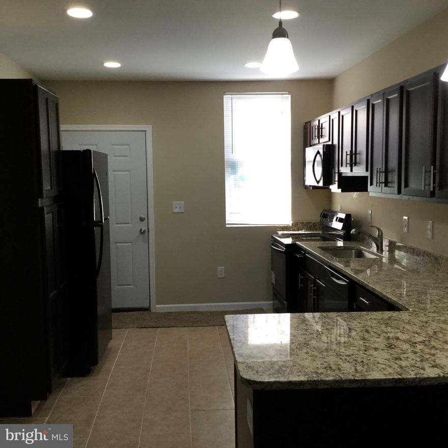 Renovated large home in Washington Village/Pigtown. All New 2 bedroom and 2 bath    New Kitchen granite counters,  appliances , hardwood floors, upgraded trim package, fenced backyard, New Hvac, Plumbing, Electric,  11x48  Must see Ground rent capitalization TBD