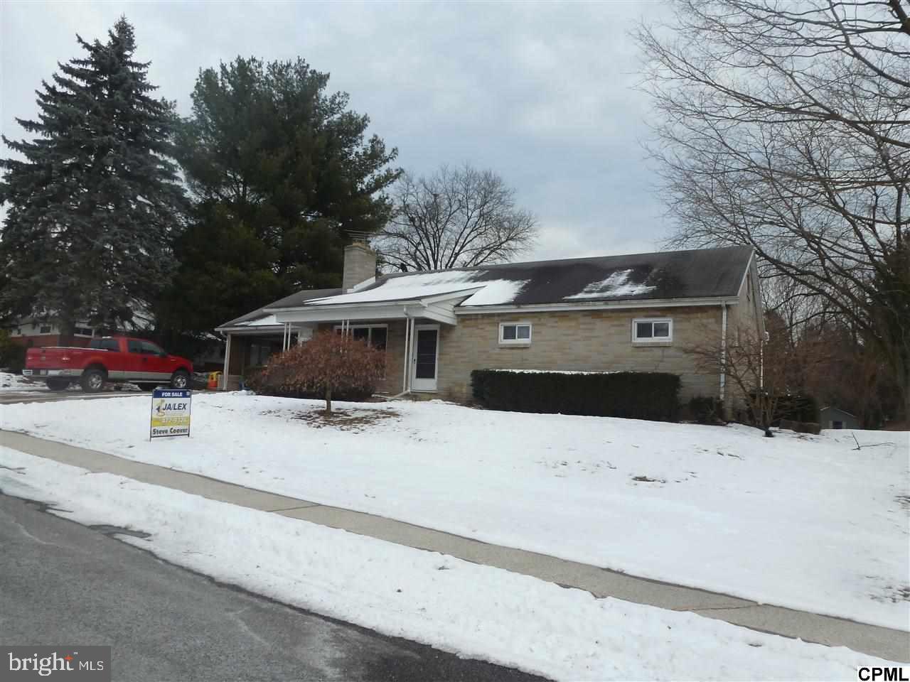 Great Ranch style family home in established neighborhood, features 4BR's, 2.5BA's, fireplace in living room and lower level family room. Carport, landscaped backyard, close to schools and shopping. Hardwood floors have been redone, carpets have been cleaned, just move in.