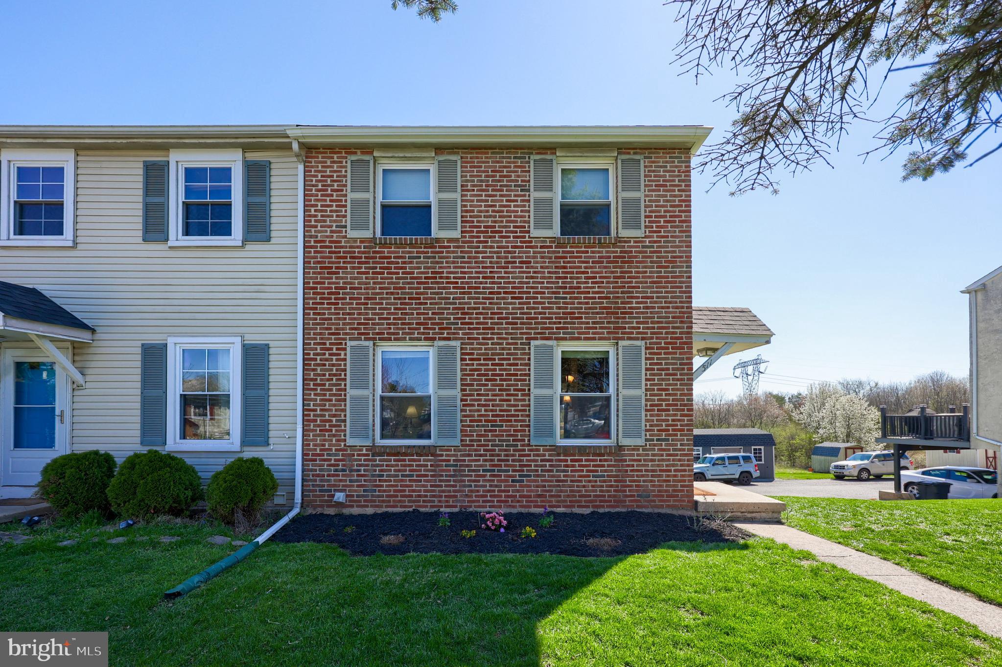 Charming end-of-row townhouse located at 511 Manor Pl in Exeter Township. This well-maintained property is ready for its next owner with a newer roof and new rear deck. Additional features of the home include two comfortable bedrooms on the second floor with a full bath and ample closet storage. A convenient half bath on the main level along with a cheery living room and open kitchen leading back to a rear deck with peaceful views. The full basement provides ample storage and includes a garage, offering easy access and added convenience. The rear yard offers off street parking and shed. Situated on a quiet residential street, with no HOA this is an opportunity to enjoy peaceful surroundings while being close to local amenities. A fantastic opportunity for cozy, low-maintenance living!