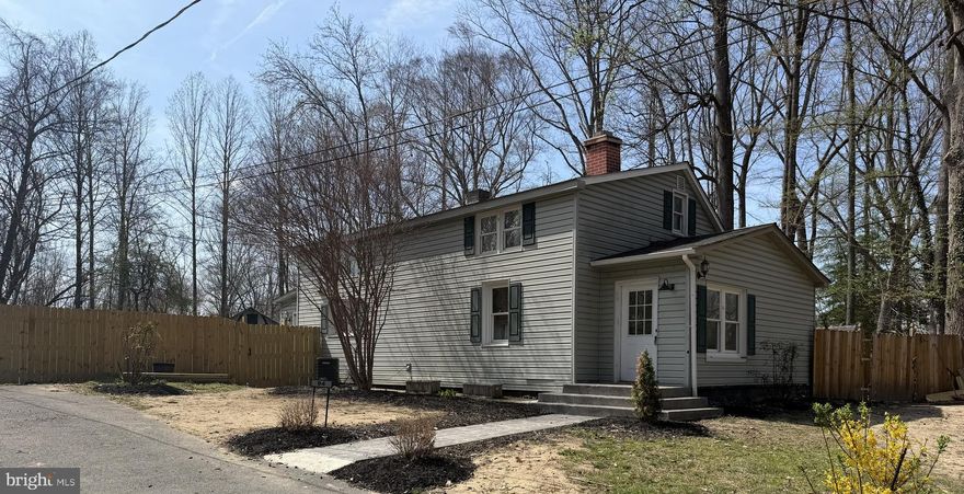 Investor Special! Fixer-upper alert in Stafford, Virginia! This versatile two-story home sits on a private lot close to Marine Corps Base Quantico and offers no HOA restrictions. Featuring four bedrooms and 1.5 baths (county records show three, but there are actually four), the layout includes a main-level primary bedroom with full bath and separate get ready area with cedar closet, for convenient single-floor living. Upstairs, you'll find three additional bedrooms and a half bath—ideal for converting into a spacious owner's suite with a little remodeling.
Inside, the good-sized kitchen provides plenty of potential, while newer flooring adds a fresh feel throughout much of the home. The living room boasts a cozy wood-burning fireplace, and the rear laundry/mudroom includes a cedar closet, with the washer and dryer staying with the property.
Outside, enjoy a fully fenced backyard complete with an operational inground pool, a pool house/shed, and a concrete patio. A carport provides covered parking, and newer stamped concrete creates an attractive sidewalk and front porch. Additional benefits include a transferable home warranty, the possibility to hook up to county sewer (currently on septic), and county water already in place.
This home is a fantastic opportunity for buyers ready to bring their ideas and sweat equity to make it shine. With its private setting near Quantico, solid bones, and room to customize, it's perfect for investors, or anyone looking to build equity through updates.