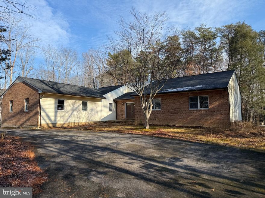 Ranch style home on beautiful, treelined, flat 1.67 acre private lot with 3 bedrooms and 2 baths with unfinished basement walk out to back yard.