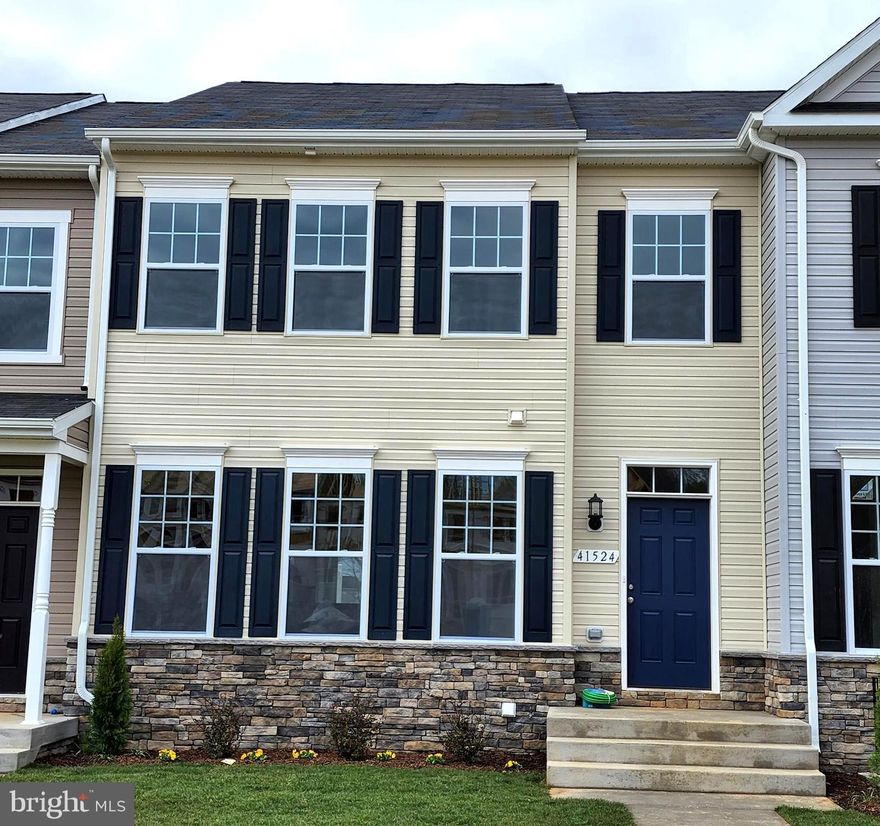 Sold & Settled New Construction Townhome at the Clark's Rest neighborhood in Leonardtown. The Compton # 1 Townhome with rear kitchen layout is over 2400 of total finished living space, featuring a  2-Car Rear Load Basement level Garage w. 3 upper level bedrooms and 2 baths,  a  half bath on the main level, as well as finished basement including a rec room and another full bath. 1st floor highlights include open layout that features a kitchen island w. sink looking into the family room as well as additional peninsula island with overhang into the dining area.  There is also a separate dining room at the front of the home as well as a family room to the side of the kitchen.  Upgraded options featured for this home include vinyl planks at  the Foyer, Powder Room and Dining Room, Stainless Steel Appliances including a microwave hood, Granite Kitchen counters, maple cabinets, ceramic floors and upgraded tub/shower surrounds for the owners bath, ceiling fan pre-wires, upgraded carpet and pad,  plus so much more! A large composite deck is also included at rear of the 1st floor. 

Community Amenities for the Clark's Rest neighborhood feature a Community Clubhouse, Pool, Basketball , Walking Trails, Tennis Courts, Playground, and sidewalks.