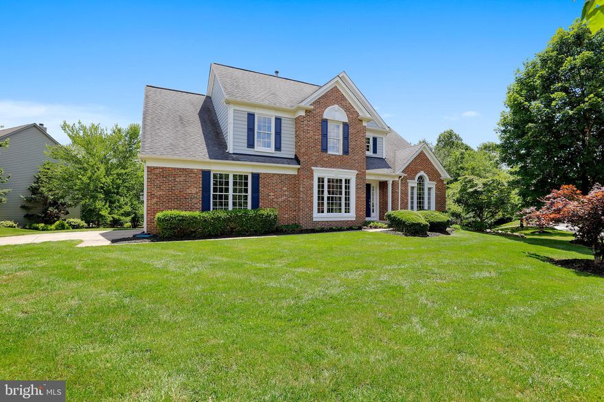 One of the best lots in Crosspointe. This beautiful home has been updated and is move-in ready. Gleaming hardwood floors throughout the main level with a view that is Natures Art Work! Double ovens in the kitchen with granite countertops along with a gas cooktop and all stainless steel appliances makes for a fabulous cooks dream! Live in this great community with two olympic sized swimming pools, 12 miles of walking and running trails, several Tot lots and tennis courts. This home is a must see an won't last long!