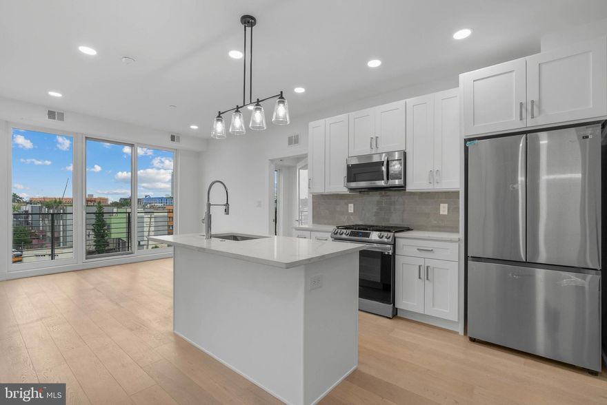 Introducing Artisans Edge – a stunning luxury condo development located on one of the most desirable blocks in Northern Liberties, one of Philadelphia’s most dynamic and sought-after neighborhoods. Most importantly this home has the ORIGINAL FULL 10 Year Tax Abatement, not the new graduated version.
 Known for its artistic roots, eclectic charm, and thriving food scene, Northern Liberties offers an unmatched blend of culture, creativity, and convenience. Artisans Edge features 13 thoughtfully designed residential units, each offering a modern and luxurious living experience with sleek, high-end finishes throughout. Choose from a variety of floor plans, all featuring spacious 2 bedroom, 2 bathroom layouts with open concept living, curated luxury finishes, a huge shared roof deck and top-of-the-line appliance packages. The penthouse units have a separate private entrance to the huge roof deck! Live just steps from vibrant 2nd Street, where you’ll find some of Philadelphia’s best dining, nightlife, and boutique shopping. You're also minutes from neighboring Fishtown, giving you even more options for weekend brunches, craft cocktails, and live music. There is a tax abatement (old abatement!). Taxes are not $1. Taxes & square footage are the buyer's responsibility to verify independently. Even though this is a new condo building, the Sellers preferred lender has 30 year fixed 5%-10% down mortgage products for this building. Please inquire with the listing team. The PAR Standard Agreement of Sale for New Construction of sale must be used for new construction properties whether completed or not. Parking is at a nearby lot (943 N 2nd St) for $325/month - while they last!
 *Photos are of a similar unit.