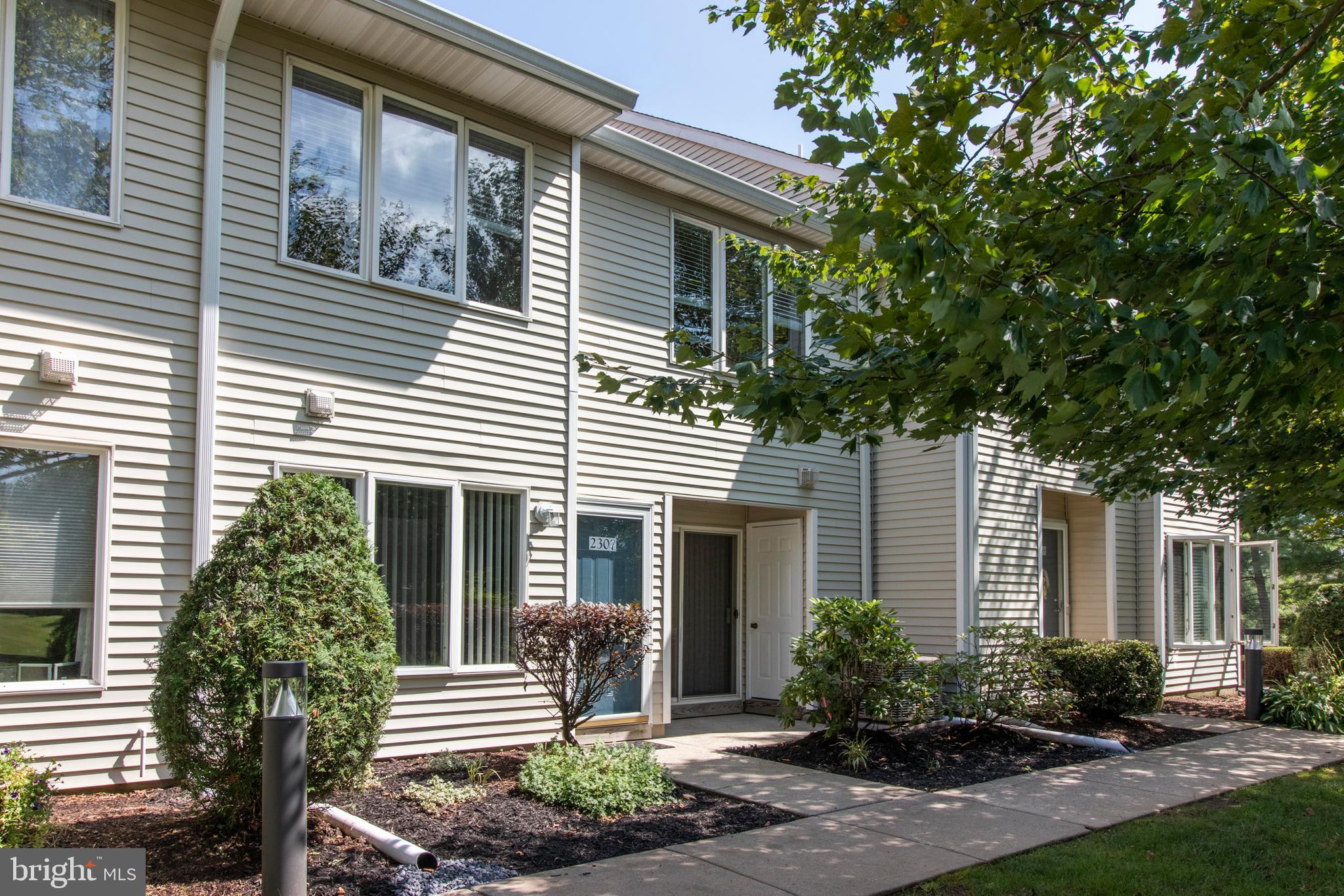Extremely well-maintained turn-key home in the highly desirable community of Montgomery Place. Take a short stroll around back from the parking lot to find this unit with a rare scenic view of nature. Enter to find immaculate interior and gorgeous new flooring throughout the main level. Large windows in the living area and sliding glass doors in the dining area afford beautiful views of outdoor while enjoying modern open floor plan. Kitchen has plenty of storage in classic oak cabinetry and is thoughtfully laid out for convenience. Upstairs feature two generous size bedrooms with a shared full bath. The larger main bedroom has walk in closet and direct access to the full bath. Fresh paint, new floors, well maintained HVAC system, newer washer and dryer in a full-service community with fitness center and outdoor pool located close to area shops and eateries and access to major roadways ultimate in convenient living!!