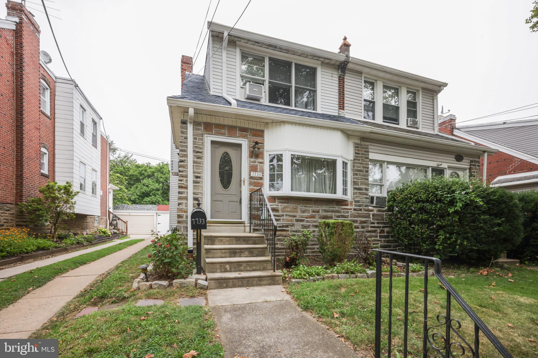 Welcome to 7733 Hasbrook Avenue, a beautifully maintained stone twin home nestled in the heart of Fox Chase, one of Northeast Philadelphia. This spacious 3-bedroom, 2 bathroom has lots of closet space and larger bedrooms that you will enjoy,
Inside to discover a warm and inviting layout with a front closed in porch and grand entrance with large living room and dining room. Large partial finished basement with full bathroom, perfect for a home office, gym, or entertainment area. The home boasts ample natural light, and a classic design that blends charm with functionality.
Enjoy the convenience of a detached garage and shared driveway, providing off-street parking as well. The quiet, tree-lined street add to the peaceful suburban feel while still being close to city amenities.
Located just minutes from public transportation, shopping, parks, and dining options. Come see this amazing home and fall in love!