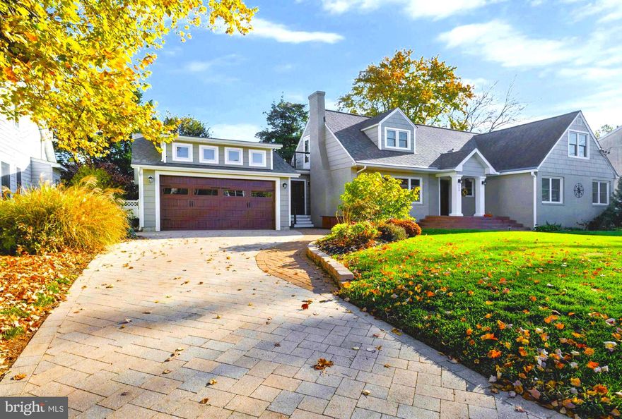 Welcome to the laid-back, maritime district of Eastport! This perfectly located home is well maintained and move-in ready. The home is sited on a 2+ sized lot and offers easy access to downtown, shopping restaurants, and marinas. The home boasts a main-level bedroom suite, newly refinished hardwood floors, and a cozy stone fireplace.  The kitchen is equipped with newer stainless steel appliances,  farmhouse sink, granite countertops, and a customized sliding door leading to the laundry room for added convenience. The Maytag large capacity, front loading washer & dryer sit on a box system to allow for easy access and provide additional storage and workspace. On the other side of the kitchen is a well-lit, oversized, multi-purpose room with additional access via a separate exterior door.  Upstairs, you'll find two large bedrooms plus a bonus room, a spacious double-vanity bathroom with loads of luxurious features, and tons of extra storage space lining the hallway.  The upper-level bathroom has an enormous walk-in shower with tiled walls and an upgraded frameless door. Take advantage of the large unfinished basement and imagine your own creative space or use it for extra storage. Fire suppression systems and hard-wired smoke detectors are bonus items that will help you sleep at night. Energy efficiencies were in mind with window replacement and all HVAC systems being upgraded; the main level gas-back-up HVAC is 6 years ago and the top level unit was just recently replaced.  Gutter Helmet was installed last year to help with keep those gutters clear of leaves & debris. A stone paver driveway provides parking for multiple cars or enjoy the convenience of the newly constructed 2-car garage. Extra shelving has been installed to help keep you organized and a heating & cooling system added for your comfort in the garage. Durable Ipe wood & cable connect the exterior staircases adding depth to the neutral color palette. Upstairs, you'll find two large bedrooms, a shared bathroom with luxurious features, extra storage space lining the hallway, and a bonus room.  The outdoor entertainment area is anchored by a Stevenson custom-built, gas-heated swimming pool complete with a 7' tanning ledge and an automatic cover. Get an exercise session in using the Michael Phelps remote-controlled Endless Pool swim jets then enjoy a soak in the  6-person hot tub. Keep your furry friends happy and safe with a dog door providing them access to their private yard. The entire backyard is enclosed with a white vinyl, low-maintenance fence for privacy and security.   With miles of trails, bike paths, and water sports options, this location is perfect for nature and water enthusiasts. Boaters will appreciate the proximity to a plethora of marinas, with the closest one just steps from your front door. Foodies will love the proximity to a variety of dining options such as Restaurant Row, Backyard Boats, and the Davis' Pub. Uniquely local Eastport's Yacht Club Light Parade and the "Slaughter Across the Water" Tug-o-War Charity Fundraiser are not-to-be-missed events.  Watch fireworks from your upper-level deck, enjoy the military flyovers, and take in the sights on your quick walk to the Naval Academy. and/or downtown.  With so much to offer, 309 State Street is the perfect place to create lasting memories.