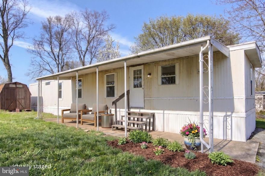 No False Advertising! This is actually a Renovated Mobile Home! Tough to believe with the open floor plan, Large Bedrooms and ample closet space how affordable your next place could be!!! This Move-In ready home is perfect for first time home buyer or someone who's simply tired of renting! New Flooring & Painting Throughout. Contemporary kitchen with enviable hardware. Off-Street Parking for 2 Cars. Covered Concrete Patio where you can add a picnic table and grill for those upcoming summer nights. No Need to rent a storage unit here.. ... there's even a detached shed for your extra stuff! Schedule your showing today! "Some photos are virtually staged for visualization. Unstaged photos are included to show the home without added furnishings or de'cor."