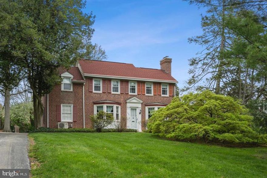 This beautiful Penn Valley colonial is located in the award-winning Lower Merion School District and is part of the high school choice zone. The home sits on nearly half an acre and blends classic charm with thoughtful modern updates, offering exceptional flexibility for today’s living needs.

The first floor features a full-size bedroom and full bathroom, providing an ideal setup for guests, family, or live-in help. This level also includes gleaming hardwood floors throughout, a living room with a fireplace, a formal dining room with a walk-in coat closet, an open, airy eat-in kitchen, and large bay windows in both the living and dining rooms. Upstairs are three spacious bedrooms, including one with an adjoining sitting room and cedar closet—easily adaptable as a nursery, playroom, or dedicated workspace—along with a nicely updated hall bathroom.

The basement has been upgraded with new flooring and is fully finished, offering additional living space for a den, gym, or playroom. The laundry room is located on the basement level, which also provides direct walkout access to the side patio/entertaining area. Recent improvements include updated lighting and a whole-house high-velocity central air system, replacing prior wall units for improved comfort and efficiency.

Set on a large, flat lot with a one-car garage and driveway, this home is just minutes from the train, Suburban Square, Trader Joe’s, and the shops and restaurants of Narberth, Ardmore, and Bryn Mawr.