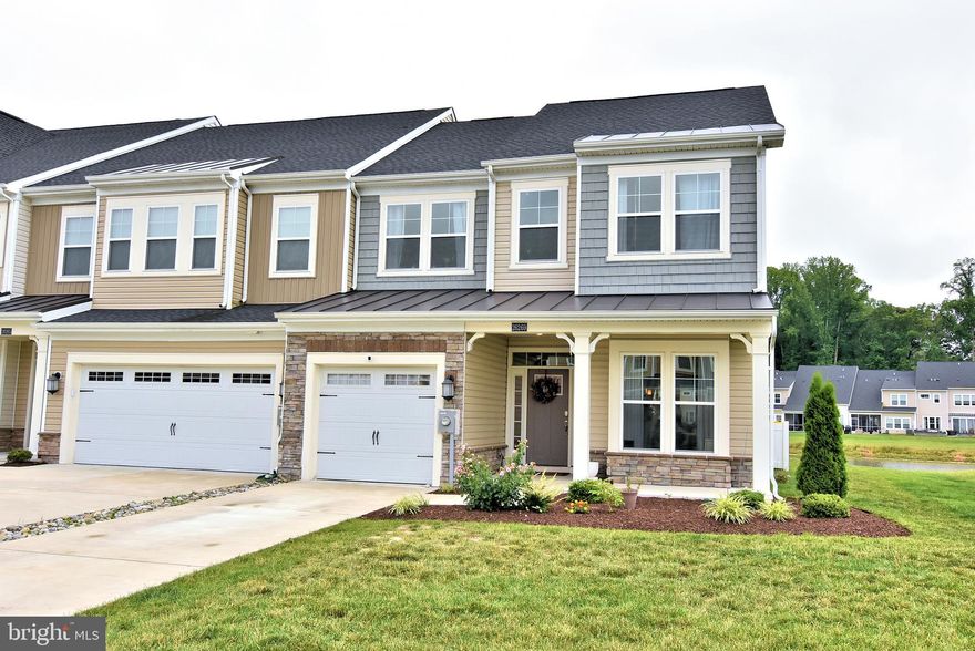 Don't miss out on this well maintained townhouse built in 2020 featuring 4 bedrooms 3 1/2 baths and a one car garage that could be used in many different ways. This well appointed townhome is an end unit allowing for more natural light, privacy and expansive pond views. Enjoy the ease of first floor living with primary suite, laundry room, powder room, open concept kitchen and living room, as well as dining room all on one level. On the 2nd floor you'll find 3 additional spacious bedrooms and 2 bathrooms with lovely quartz counter tops throughout the home. Plenty of parking in the driveway and overflow parking lot just across the street from the townhome. Enjoy the community pool and living maintenance free with the HOA taking care of trash, exterior of unit, lawn care & irrigation.