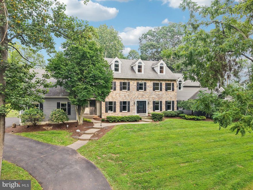 At the very end of one of Bucks County’s most desirable and private lanes lies an over 4700 sq ft home that only a select few will ever have the chance to call their own. Nestled along a tree-lined driveway and perched on nearly 4 wooded acres overlooking the 4th green of the world-class Lookaway Golf Club, this stone-front home delivers something money can't always buy—exclusivity and family fun.
This isn’t just a home—it’s a lifestyle reserved for the fortunate few. One of only five properties on this private road provides unmatched serenity and charm. The setting alone—quiet, established, and completely removed from the outside world—feels like a country estate, yet you’re just minutes from Historic Doylestown, New Hope, Newtown and all the best of Central Bucks.
Inside, the home offers over 4,800 sq ft with a classic layout,  front and back staircases. Spacious formal rooms with high ceilings, a bright kitchen with custom cabinetry and high-end appliances, and a two-story foyer provide an elegant backdrop, while tall windows bring the outdoors in. The heart of the home opens to a sunlit paver patio—your gateway to everyday relaxing and unforgettable gatherings.
Upstairs, the primary suite features a walk-in closet, fireplace, and full bath with soaking tub, walk in shower and dual vanity. Additional bedrooms are graciously roomy along with a large 2nd suite also with walk in closet and full bathroom. Need more space? Step up to the full-height, floored attic—or down to the finished basement featuring a pre-wired home theater and abundant storage. A 3-car garage, water softening and purifying system, security system, and abundant storage complete the home’s amenities.
But what truly sets this property apart isn't found on a spec sheet. It’s the feeling of driving down your private lane each day. The pride in owning a piece of Lookaway’s storied legacy. The comfort of knowing your view—and your privacy—are protected.
Homes like this don’t come along often, and once it’s gone, it may be years before another opportunity arises. Don’t miss your chance to own one of Bucks County’s best-kept secrets. Agent related to seller