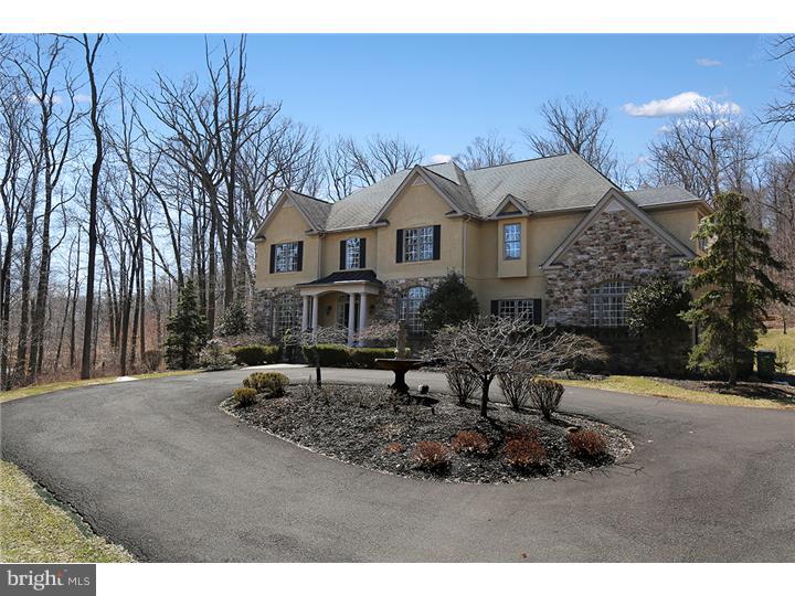 Exclusive location in Upper Makefield Township. Magnificently designed stucco and stone French-style Manor house perched on a knoll overlooking the lush countryside. Impeccably maintained inside and outside. Grand two-story entry. Formal living room and dining room graciously outfitted with wainscoting and crown moldings. Sun-drenched family room, raised hearth stone fireplace with flanking custom bookshelves and floor-to-ceiling windows overlooking lush gardens and outdoor Veranda. Open to gourmet custom kitchen with granite counter tops, center island, premium stainless appliances including Thermador,Dacor,Subzero and Marvel wine refrigerator. Spacious breakfast room opens to outdoor entertaining area. Throughout this elegant home are hardwood floors, custom trim, transom windows, vaulted and tray ceilings. Upstairs features a stunning master suite with coffered ceiling, bay window and sumptuous master bath, double sinks, Jacuzzi tub shower and walk in closets. Three additional bedrooms all with private baths and walk in closets. The lower level has all the room and space for family activities. Additional family/rec room, game room, exercise room and additional suite with full bath for overnight guests. Located on 5 majestic acres in Jericho Mountain Estates. Minutes from Jericho Mountain Golf Course, the scenic Delaware River and hiking and biking paths. Truly a magnificent estate!