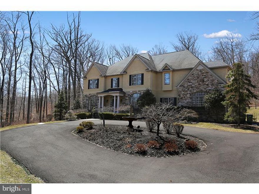 Exclusive location in Upper Makefield Township. Magnificently designed stucco and stone French-style Manor house perched on a knoll overlooking the lush countryside. Impeccably maintained inside and outside. Grand two-story entry. Formal living room and dining room graciously outfitted with wainscoting and crown moldings. Sun-drenched family room, raised hearth stone fireplace with flanking custom bookshelves and floor-to-ceiling windows overlooking lush gardens and outdoor Veranda. Open to gourmet custom kitchen with granite counter tops, center island, premium stainless appliances including Thermador,Dacor,Subzero and Marvel wine refrigerator. Spacious breakfast room opens to outdoor entertaining area.  Throughout this elegant home are hardwood floors, custom trim, transom windows, vaulted and tray ceilings. Upstairs features a stunning master suite with coffered ceiling, bay window and sumptuous master bath, double sinks, Jacuzzi tub shower and walk in closets. Three additional bedrooms all with private baths and walk in closets. The lower level has all the room and space for family activities. Additional family/rec room, game room, exercise room and additional suite with full bath for overnight guests. Located on 5 majestic acres in Jericho Mountain Estates. Minutes from Jericho Mountain Golf Course, the scenic Delaware River and hiking and biking paths. Truly a magnificent estate!