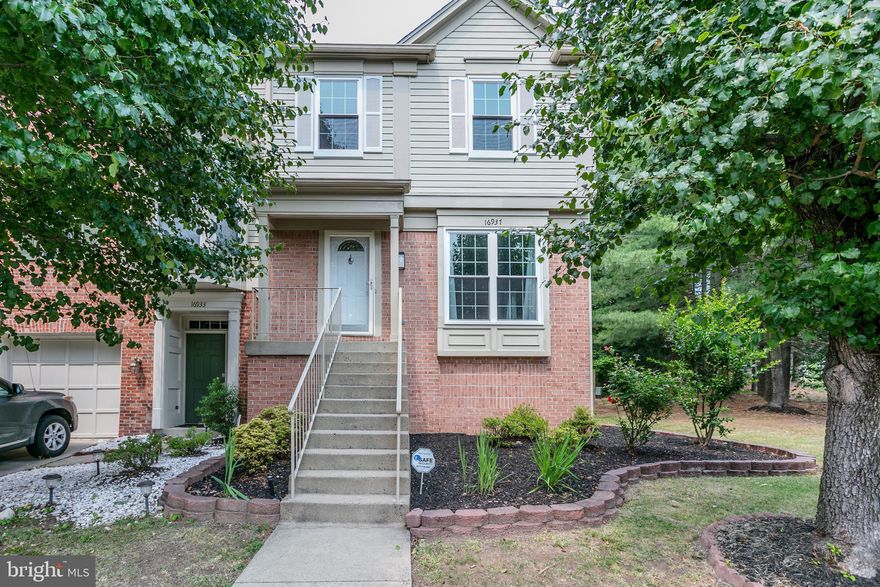 Turn key, 3 level end unit townhome in River Oaks.  When you walk into this bright home you will notice the beautiful hardwood floors on the main level and tons of light.  The large living room flows into the spacious kitchen and dining room. The sliding doors to the deck contribute to more natural light in the home. There are two large primary bedrooms upstairs each with their own full baths!  The fully finished basement has a den that can be used as a third bedroom, a full bath, a rec room with a wood burning fireplace. Home backs to trees, has a large backyard, and is fully fenced.  Conveniently located to playground, pools, and entrance of community.  Close to Rt 1, I95, Quantico, Fort Belvoir, and lots of shopping.