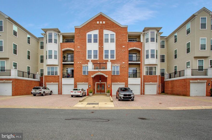 Welcome to 8615 Wandering Fox Trail, Unit 405, in the highly desirable 55+ community of Piney Orchard. This beautifully maintained top-floor condo offers 1,500 square feet of elegant living space with an open, light-filled floor plan designed for both comfort and style. <br><br>

The home features two spacious bedrooms, two upgraded full baths, and a versatile den that’s perfect for a home office or guest space. The primary bedroom includes a generous sitting area, a large walk-in closet, plus additional closet space for extra storage.  <br><br>

The gourmet kitchen boasts 42-inch cabinets, granite countertops, stainless steel appliances that are only three years old, under-cabinet lighting, and hardwood flooring—also carried through the dining room and living room for a cohesive, upscale feel. A separate dining area flows seamlessly into the inviting living room, which opens to a private balcony—ideal for enjoying morning coffee or peaceful evenings outdoors. <br><br>

Additional highlights include elegant window treatments, crown molding, an in-unit laundry with a full-size washer and dryer, and parking for two cars (one in the private garage and one in the driveway). The building’s common areas have also been recently updated with fresh paint and new flooring, creating a modern and welcoming atmosphere.<br><br>

Residents enjoy exclusive amenities including a clubhouse, fitness center, indoor and outdoor pools, and numerous planned social activities. The building offers secure access, an elevator, and beautifully landscaped common areas. Piney Orchard residents also benefit from additional community amenities such as scenic walking and biking trails, tennis courts, and community events.<br><br>

Perfectly situated near shopping, dining, and major commuter routes—including Fort Meade, NSA, BWI Airport, the MARC train station, and routes 32, 97, and 100—this home offers an exceptional combination of convenience, comfort, and active adult living.<br><br>

Schedule your private showing today and see why this top-floor residence stands out as one of the best values in the community.