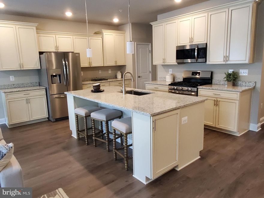 Beautiful new Breckenridge floor plan with 4 levels of luxurious living and all the bells and whistles. Kitchen with large island, stainless steel appliances and granite counters with open floor plan to family room and dining area. 3 bedrooms, 2 full baths, 3 half baths, 2 car garage, family room,  recreation room, 4th level loft with rooftop deck.  Back to trees and walk to Waugh Chapel Towne Centre with movie theater and lots of shopping and dining options. Community has a clubhouse, fire pit, tot lot, boccie ball and walking trails.  Off of Route 3 and convenient to DC, Annapolis and Downtown Baltimore.  Pictures are of the model.