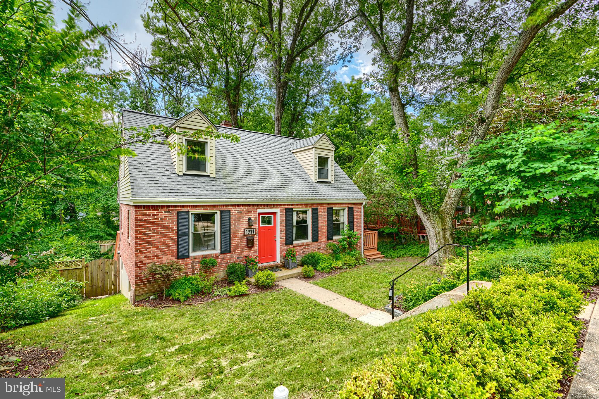 Welcome to 1911 Fairbank Road— a beautifully updated gem tucked away on a quiet dead-end street, perched atop a hill in the heart of Mount Washington. Renovated from top to bottom in 2020 and thoughtfully enhanced since, this home offers the perfect blend of charm, comfort, and modern convenience with over 2000 square foot finished living space!
Step inside to a bright, open layout featuring a stunning tray ceiling in the living room and a warm, welcoming kitchen with white cabinetry, stainless steel appliances, granite countertops, and a large island—ideal for cooking and gathering.
The open-concept living space flows seamlessly to a spacious 34X12 foot deck overlooking your own private garden oasis. Lush landscaping, privacy fencing, gravel pathways, a trellis, pergola, and hammock create a tranquil retreat perfect for relaxing, gardening, or entertaining. Enjoy your morning coffee to the sound of birdsong and the gentle stream of Western Run flowing just beyond the property.
You’d never guess you were in Baltimore City—deer sightings are common, and the setting feels like a peaceful escape from it all.
The main-level primary suite features a private full bath and a walk-in closet with custom cabinetry, along with a convenient powder room nearby. Upstairs, you'll find two additional bedrooms and a full bath—perfect for family, guests, or a home office setup.
Downstairs, the finished walk-out basement adds even more living space with a large family room, an additional bedroom, and another full bath, laundry and storage space—offering great flexibility for guests, work, or play. All full baths feature beautiful designer tile!
Situated on a quiet hilltop in sought-after Mount Washington, you’ll enjoy a serene neighborhood feel while staying just minutes from city amenities, commuter routes (I-83), and everything Baltimore has to offer. Don’t miss this move-in ready home where modern updates meet timeless charm in a truly picturesque setting. You have to see this one in person, it is a BEAUTY!!