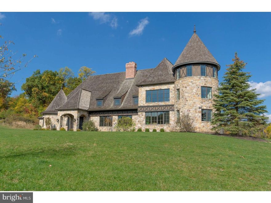 SALE PENDING Set in the heart of Saucon Valley, Newport Ridge offers sprawling lawns & room for tennis courts & pools in a bucolic setting centrally located for traffic-free access to Bethlehem, Allentown & I-78. The inspiration of a passionate and innovative home builder/owner shines through in the detailed design and exceptional floor plan of this newly completed Myron Haydt original. European influences are evident in the stunning fieldstone and brick exterior, dramatic cedar shake rooflines and captivating turrets. Sited at the apex of one of two cul-de-sacs in the enclave known as Newport Ridge, the 2.5 acre setting is lush and serene. Luxurious amenities and outstanding finishes include thick oak and marble floors, extra high baseboards, deep crown moldings and curved walls. Wood ceiling beams, two commanding fireplaces and oversized true divided light windows highlight elegant living areas. The stunning kitchen is unparalleled in its beauty and functionality with a custom wood coffered ceiling, solid marble countertops, state-of-the-art stainless appliances, and plentiful prep, pantry and entertaining space. Elegant master bedroom suites are found on the main and second levels. Both are outfitted with dual walk-in closets, sizeable retreat/exercise areas, and sumptuous baths appointed with jetted tubs, resort quality walk-in showers and custom vanities. Three additional en suite bedrooms and two powder rooms offer the superior accents one would expect from a home of this caliber. Intricate brick patios are accessed from the sunroom and family room and are privately tucked away for intimate dinners under the stars or lively celebrations.