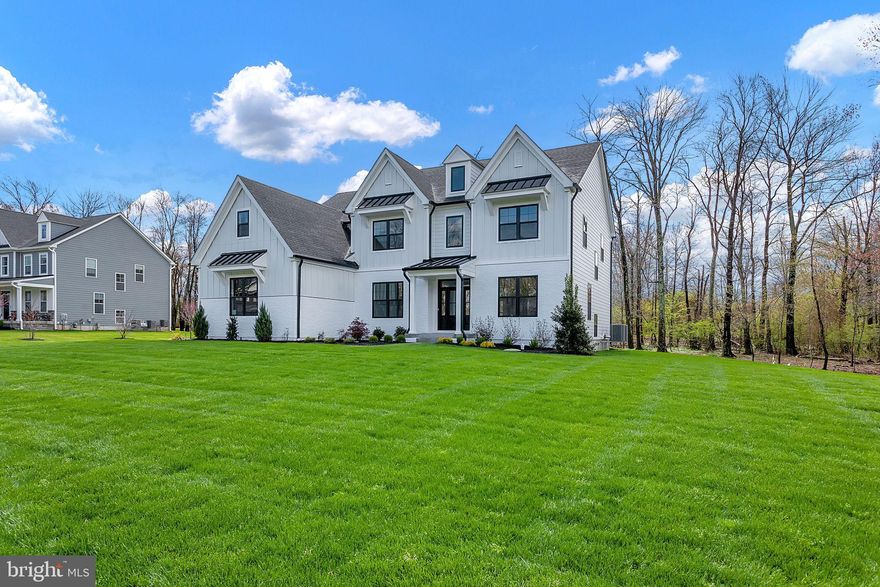 This new construction home built by Marc Salamone Homes sits on a 1+ acre in a cul de sac setting. Features include a Gourmet kitchen with large center island with quartz countertops, GE Café 36” slide in range, hood vented to outside, additional oven, microwave drawer, dishwasher, under cabinet lighting, under cabinet outlets, lighting in the upper glass cabinets and pantry closet. The kitchen and dining area open to the impressive great room with feature ceiling, a gas fireplace with remote and butler’s pantry with beverage center and sink. The main floor also features 9ft ceilings, formal dining and living rooms, a private study, a mudroom with access to the 3-car attached garage and driveway, convenient powder room, hardwood floors throughout the first floor. Upstairs you'll find the impressive  Owners Suite offering a Cathedral ceiling, feature wall, sitting room, three walk in closets and double doors leading to the luxurious bath including a Cathedral ceiling,  large shower with bench, soaking tub, two vanities, linen closet and private water closet. Three large bedrooms complete this floor including a princess/prince suite with own full bath along with another full bath and convenient upper floor laundry room. 9’ basement walls, roughed in plumbing for full bath and plenty of options to finish the space.