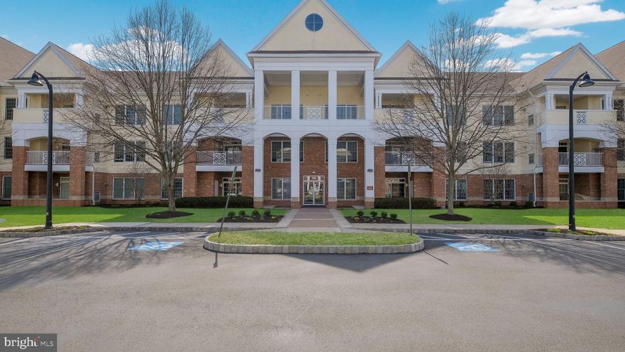 Are you ready to experience the simplicity of downsizing while still enjoying the style, features and spaces you've always loved?  1218 Meridian Boulevard makes it easy.  As you arrive at the community notice the beautiful landscaping and fountain as well as scenic walking paths and benches making it a pleasure to take a stroll.  The Shops at Valley Square including Wegmans are just steps away too.  Come inside the secure lobby and the elevator will take you to the second floor where the original owner specifically selected this unit during the initial phase of construction.  Inside the home the welcoming foyer features hardwood flooring, crown molding, a coat closet and 9-foot ceilings throughout.   The kitchen offers plenty of cherry cabinetry and is anchored by a two-tiered island with a functional solid surface counter-height work area paired with a raised bar-height section for dining and entertaining.  A secondary prep/bar sink is ideal for cooking and entertaining.  Opening from the kitchen the great room includes a private balcony overlooking the outdoors and a gas fireplace creating an inviting focal point.  The primary suite has everything you need with a sitting area, large bedroom, two walk-in closets and an expansive ensuite bath with soaking tub, double vanity and stall shower.  Guests will enjoy the generous second bedroom with its own balcony and walk-in closet.  The full hall bath with tub shower can be accessed from the second bedroom or the hallway.   Complemented by a second oversized linen closet, the convenient laundry offers the washer/dryer, utility sink and extra storage.  Speaking of storage there is a dedicated unit on the first floor with shelving perfect for securing holiday decorations, luggage and any other large items.  Steps away from that is the one-car garage with opener.  A newer heating system (2024) and hot water heater (2021) provide additional peace of mind.  Meridian at Valley Square residents enjoy a variety of amenities including the clubhouse with fitness center, game room, pool tables, library and outdoor pool.  The exceptional location is just minutes away from shopping, restaurants, golfing, movie theaters and bowling as well as renowned medical care at Jefferson Abington Hospital, Penn Medicine Doylestown Hospital and Rothman Orthopaedics.  Schedule your showing today and step into the lifestyle you've been waiting for.