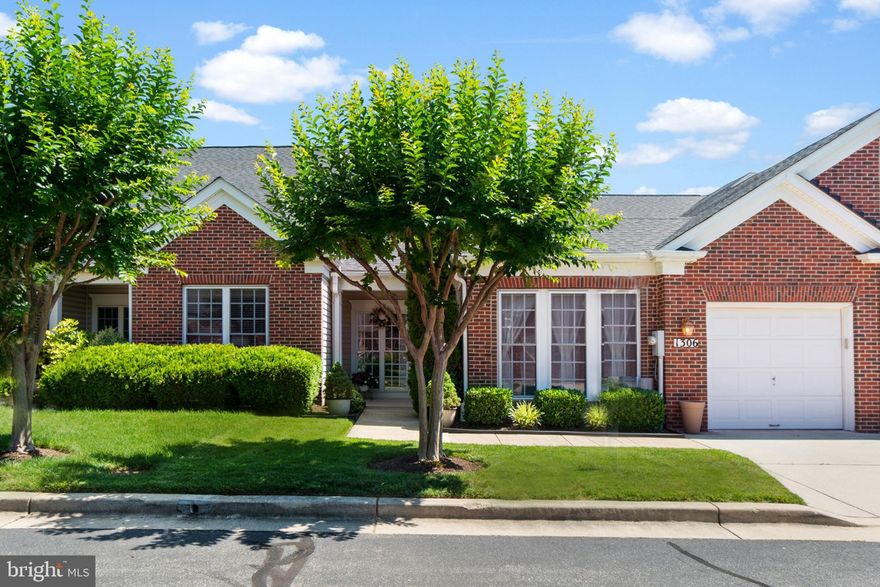 PRICE IMPROVEMENT!!!!!  ACTIVE ADULT SINGLE LEVEL LIVING in the VILLAS OF ROCK OAK 55+ community with gorgeous natural surrounds MINUTES FROM METRO AMENITIES!  Coveted 2BR Villa-style home with garage and PRIVACY FENCED PATIO & GARDEN.  TOTALLY TURNKEY with spotless decorator neutral paint palette/carpeting, glossy wood floors, custom built-ins, ceiling fan breezes, & recessed lighting.  Open concept combined Living & Dining Rooms, on-trend crisp white Kitchen w/dining bar, and glass encased Sunroom opening to peaceful patio & yard.  Generous Primary BR w/ensuite luxury Bath & enviable walk-in closet.  2nd Bedroom or possible Home Office with wall of built-in bookcases. 2nd Full Bath & Laundry Closet.  Driveway parking and 1-car garage.  Just a short distance away is the scenic WB&A trail which is perfect for leisurely walks.  It also provides a pleasant route for dog walking, making it a favorite among pet owners in the area. Prime location mere minutes from Waugh Chapel shopping & dining, parks, golf, O’Malley Senior Center, & commuter RTs 97/3/50.  20 Minutes from Annapolis; 40 minutes from Baltimore & D.C.  COVETED TRANQUILTY with URBAN INDULGENCES!