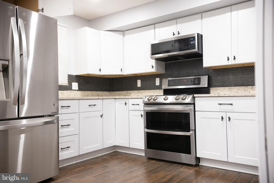 This distinctive home in a sought-after neighborhood offers a warm welcome with its well-manicured exterior and inviting entryway. Spread across Two levels and a Walkout Basement, the living spaces inside are bathed in natural light, creating an airy and comfortable atmosphere. The main level features a kitchen, a focal point of the home, with modern amenities and a functional layout. Bedrooms provide a peaceful retreat, and the private patio space is an ideal oasis for relaxation and gatherings. The Walkout basement, an additional level of versatile space, adds to the home's appeal, offering potential for various uses. With a commuter lot nearby for convenient travel and only 20 minutes from Washington DC, this address seamlessly blends suburban tranquility with easy access to the vibrant energy of the nation's capital. The added perk of plenty of guest parking enhances the welcoming ambiance, making this residence perfect for hosting friends and family.