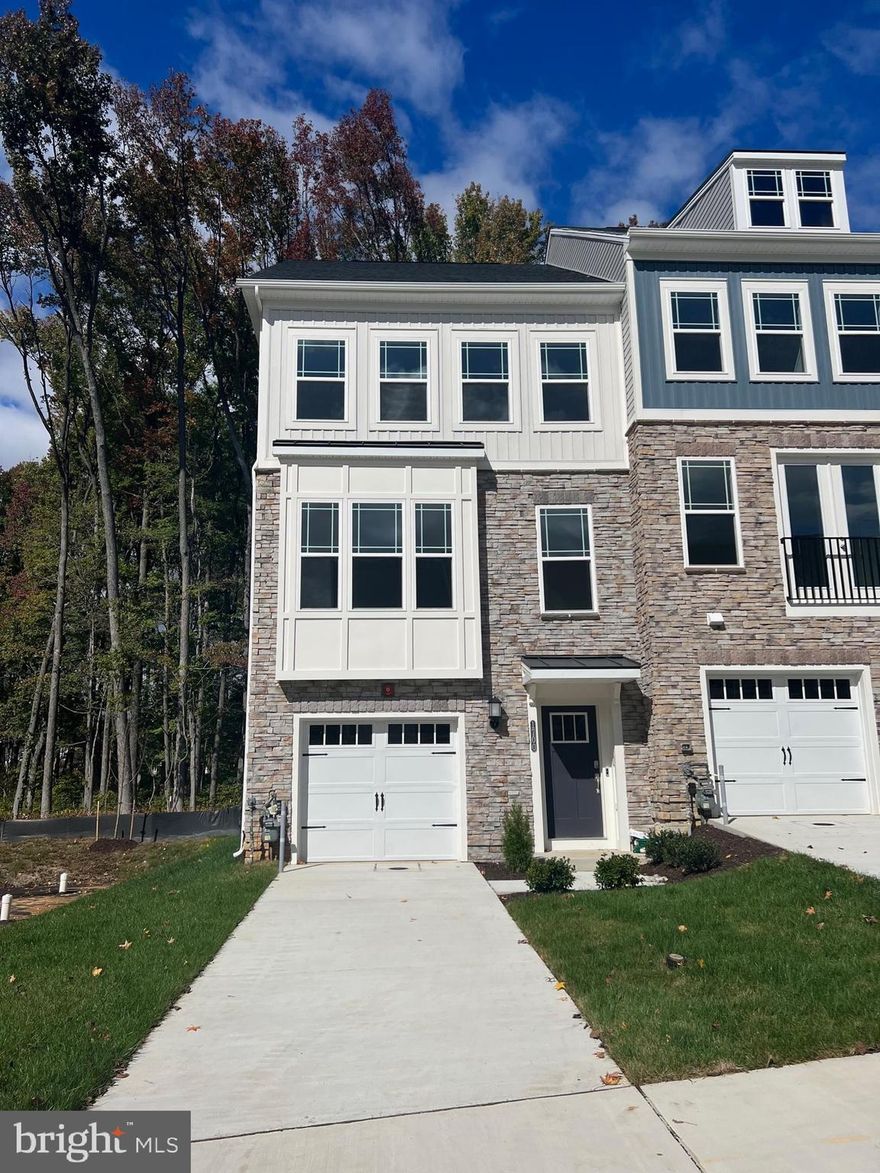 Brand new luxury townhome that is a first time rental.  All is new!!  Main level has a huge Rec Room with full bath that can be used as a bedroom.  The entertainment level is a dream!   Large expanded kitchen with upgraded cabinets, Stainless Steel appliances, and granite counters.  Hardwood floors.  Walk out from the family room to this gorgeous maintenance free deck with trees behind you.  Large master bedroom suite with grand master bath with granite counters and tile floors and walk in closet.  Two other good size rooms share a hall bath that is also upgraded.  Walk up to the 4rth level and find another bedroom/office/Rec Room with a half bath and a roof top deck that is to die for.  One car garage and there are extra parking spaces right around the corner from this.  Where else can you find something like this in this price range!!  Within 15 minutes to downtown Baltimore and all that comes with it.  Fantastic commuter location.  Awesome community where two piers are going to be finished that you can use and enjoy for kayaking, etc...  Hurry!