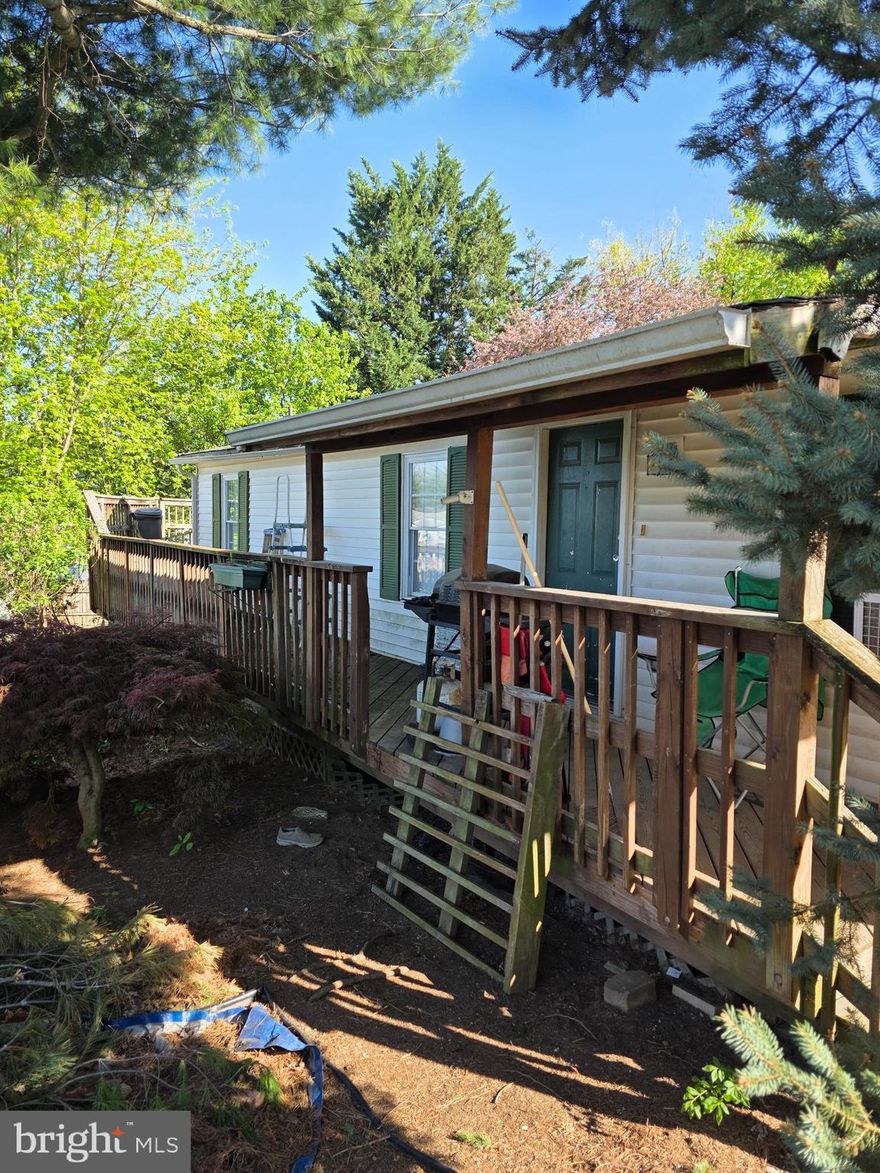 Are you tired of renting and looking for an affordable detached home to call your own? Look no further than 12023 Heather Dr. This double-wide sits on an owned lot conveniently located in Highland Manor, just minutes from I-70. The home features 3 bedrooms and 2 full baths.  A nice-sized living room with large windows and an open floor plan for the kitchen and living room.  Fully fenced and located across from one of the community playgrounds. HOA covers common areas, trash, and road maintenance