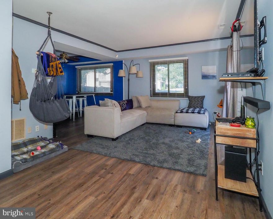 Charming, updated 2 story condo. New Stainless Steel appliances, granite countertops, LVP flooring downstairs and hardwood upstairs. Brand new HVAC.  Nicely sized outside area with a deck and patio. Gated  yard. Condos in this comminity do not last so make an appointment today!