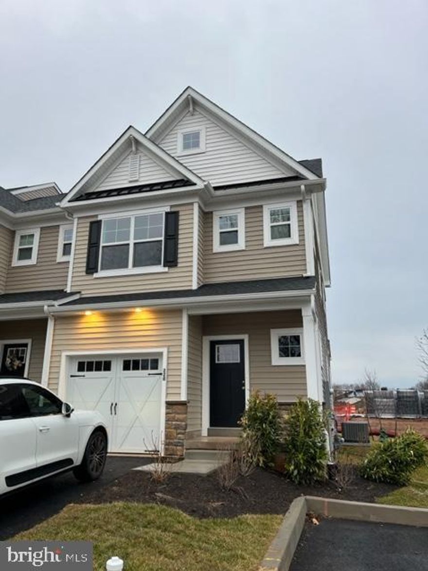 Be the first to live in this Brand New Construction Home, Never Lived In.  Enter this airy and bright townhome through a covered front porch entrance and flow into  open-floor plan with Island kitchen with contemporary cabinetry.  The  living room space has tons of natural light flowing through the sliding glass door leading to the rear patio,  perfect for entertaining. The spacious kitchen includes a large center island, which overlooks the great room and dining area, granite countertops and stainless-steel appliances and easy to access storage closets.  This end-unit townhome takes advantage of all the natural light and the first floor is complete with a  half bath, thoughtfully-placed storage closets and a one-car garage.   On the second floor are two generously sized bedrooms, each with their own walk-in closet; a large laundry room and a full bath.  Continue to the third-floor where your dream  awaits!  The Owner’s Suite includes two grand walk-in closets, a spacious bath with a 4’ tile shower and bench, cultured marble topped double-sink vanity and linen closet; a lounge area for a home office or cozy reading nook completes this luxurious suite.  Property is between King of Prussia and Plymouth Meeting. Within minutes are beautiful parks, historic sites, world-class shopping and local eateries, providing the perfect balance of suburban living. Your daily commute or weekend travels becomes a breeze with close access to Interstates 476 and 276, and Germantown Pike. The nearby City of Brotherly Love, Philadelphia, is less than an hour away, where you can take advantage of the rich history, diverse culture or award-winning restaurants.