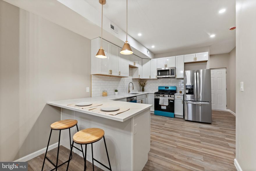 Welcome to 602 Denison St, a beautifully renovated 3-bedroom, 2-full-bath and 1-half bath Baltimore rowhome offering modern upgrades and timeless charm. This home features a brand-new kitchen with stainless steel appliances, quartz countertops, contemporary cabinetry, and sleek finishes. Enjoy durable LVP flooring throughout the main and upper levels, along with a newly installed HVAC system (2025).
The main level provides a bright, open layout that flows seamlessly to the fenced backyard perfect for outdoor living. On Level 2, you’ll also find a spare room ideal for a home office, study space, or flex room, adding valuable versatility to the floor plan. A covered front porch adds inviting curb appeal, while the renovated walkout basement offers 1 -bedroom 1- full bath and a kitchenette. Some photos have been virtually staged to help showcase the home’s charm.

This home has been thoughtfully updated and is a must see!!!