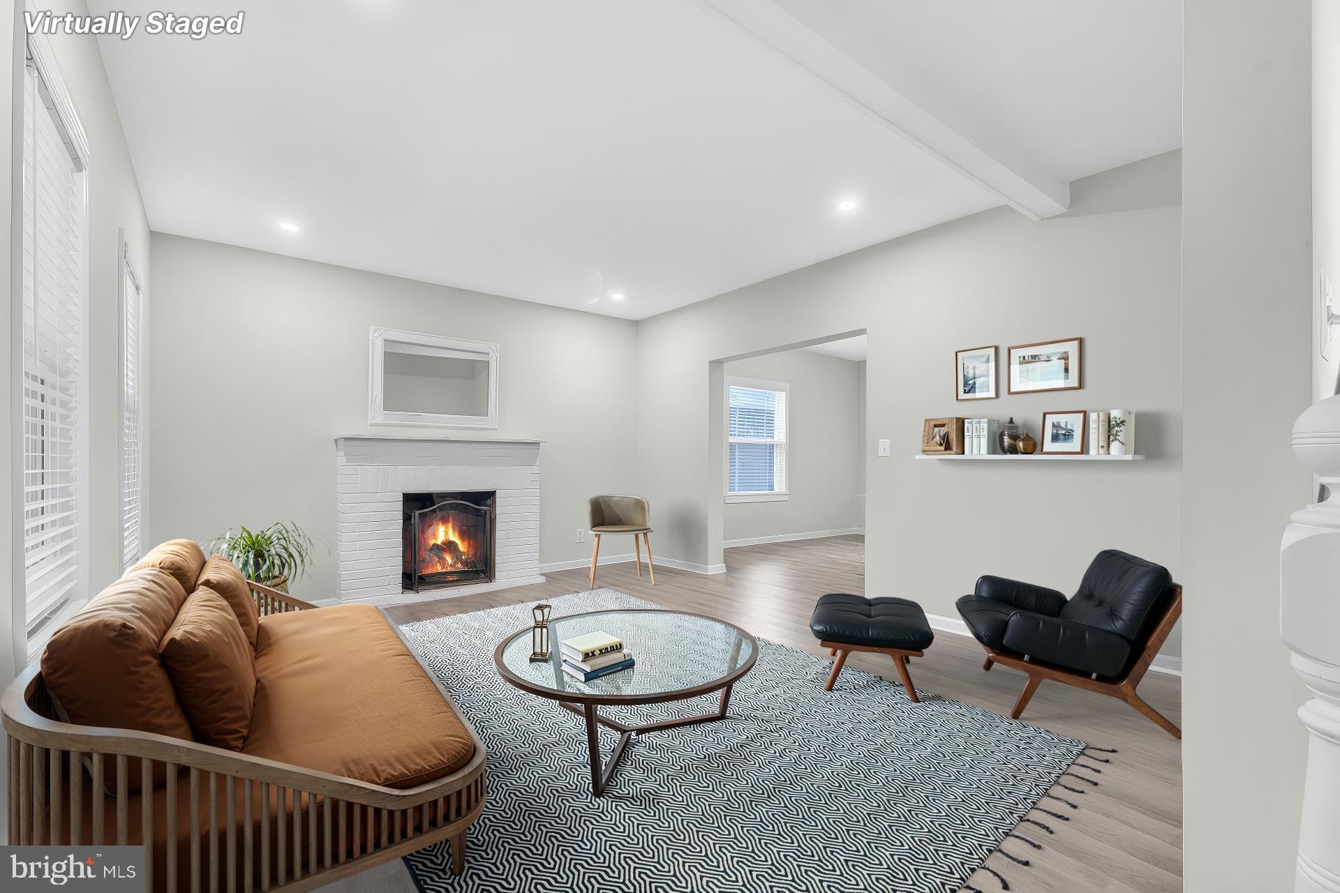Step into timeless charm and modern comfort in this stunning 7-bedroom, 4.5-bath expanded farmhouse, boasting over 4,000 finished sq ft of beautifully updated living space. Originally built in 1915, this rare gem seamlessly blends historic character with thoughtful renovations designed for today’s lifestyle.
From the moment you arrive, the covered front porch invites you to unwind and enjoy peaceful evenings in a friendly, tree-lined neighborhood. Inside, the spacious main level features a warm living room, elegant dining area, and a gourmet eat-in kitchen that opens to a rear patio—perfect for hosting unforgettable gatherings. The grand great room with a fireplace and dual staircases adds striking architectural flair and practical flow. Upstairs, relax in the generous primary suite with a private en-suite bath, complemented by four more bedrooms and two full baths. The finished lower level offers two additional bedrooms, a full bath, and a flexible unfinished area with laundry and walk-out access—ideal for a home gym, storage, or custom workspace. Enjoy the best of both nature and convenience with Lake Artemesia and local parks just moments away, plus shopping, dining, and entertainment in nearby College Park. Commuting is easy with access to major routes and public transportation. Don’t miss this rare opportunity to own a truly special home in Berwyn Heights. Schedule your private tour today!