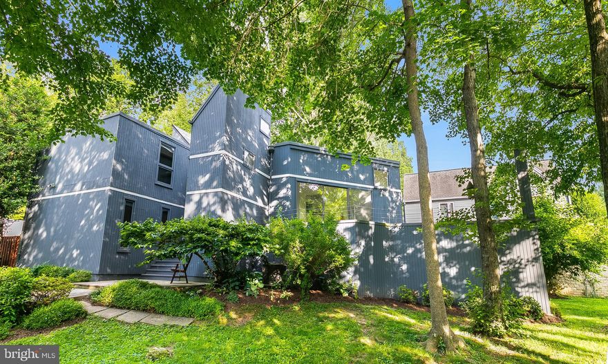 One-of-a-Kind Contemporary Home in the Heart of McLean!  Bursting with character and warmth, this unique 5-bedroom, 2.5-bath contemporary home offers a perfect blend of charm and functionality. The home features bright, light-filled rooms, including a spacious living room with patio doors leading to a large deck and a cozy formal dining room that opens to the backyard—ideal for family gatherings and entertaining. Beautiful hardwood floors run throughout, adding warmth and continuity to the inviting layout.
The updated kitchen provides a warm, inviting space where character meets convenience. Thoughtfully designed for everyday living, it includes a cozy eat-in area—perfect for casual family meals. It’s a true gathering spot and the heart of the home.
A loft-style office overlooking the family room provides a bright, open workspace—perfect for staying connected to the heart of the home. A separate den with access to the backyard adds even more flexibility, perfect for a home office, playroom, or cozy retreat. Completing the home’s generous living spaces is a spacious recreation room, providing endless possibilities for work, play, or relaxation.
Set on a uniquely large and deep lot for the neighborhood, the fully fenced backyard offers exceptional privacy, space, and potential for outdoor enjoyment. Located just a short walk from downtown McLean, top-rated schools, and public park—and with unbeatable access to all major commuter routes—this home is a rare find in an exceptional location.