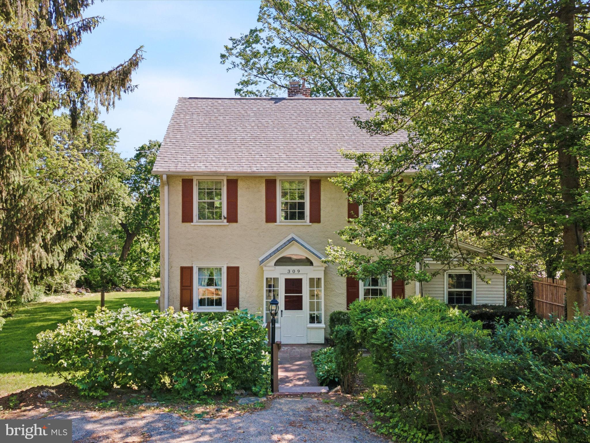 Unique and Rare Opportunity in the Heart of Wayne! A 4-bedroom, 2.5 bath Colonial on a deep lot that includes two separately deeded parcels and offers a private backyard oasis in the heart of Radnor Township. Across from the Wayne Art Center, this home provides easy access to the Radnor Trail and is a short walk to the center of Wayne and its restaurants, shopping and Wayne train station.
Welcome to 309 Conestoga Road, where classic architecture meets thoughtful, modern expansion in one of Radnor Township’s most sought-after neighborhoods. This home's 2022 major addition nearly doubled its size while adding a dream kitchen and two and a half brand new bathrooms. The heart of the home is the stunning open-concept new kitchen and family room. The kitchen features granite countertops, stainless steel appliances, and a center island. The expansive family room offers the perfect blend of comfort and connection for modern living. With a seamless open-concept layout, it’s ideal for everyday family gatherings, entertaining guests, or simply relaxing in style. Large windows flood the space with natural light, while the easy flow to the kitchen makes hosting a breeze. Whether you envision cozy movie nights or lively holiday celebrations, this inviting space delivers versatility and warmth. The seamless flow of this home continues into its formal dining room while the comfortable front living room and fireplace offer an ideal spot to unwind. A den/study with sliding glass door leads to a side deck, offering privacy and connection to the outdoors. A new half-bath completes this floor.
Upstairs, a newly added and oversized primary bedroom is a spacious and serene retreat. Large windows offer expansive views of the lush outdoor space beyond. Don't miss the walk-in closet and the beautifully designed en-suite bath including double sinks and an oversized shower with dual shower heads. Three more generously sized bedrooms provide flexibility for family, guests or a home office. The new full hall bath features double sinks and a convenient laundry chute. The full basement includes a partially finished area currently used as a game room as well as a new 28x28' unfinished walk-out addition. The added basement space was thoughtfully designed for future use and includes air conditioning, three windows, sliding glass door, high ceilings and a rough-in for a future full bath.
While the information on this listing shows the acreage for 309 Conestoga, the sale includes the separately deeded 307 Conestoga, offering an expansive yard and potential for future development.
Significant updates include a full conversion from oil to natural gas (2017); installed central air (2022); newer boiler and water heater (2017); complete plumbing overhaul (replaced cast iron main water line, replaced sewer line); an electrical upgrade removing all knob-and-tube wiring; and all new roofs (back roof added 2022, front roof replaced 2024).
Located in the highly ranked Radnor Township School District and within walking distance to downtown Wayne, this exceptional property offers a rare opportunity to make it your own.