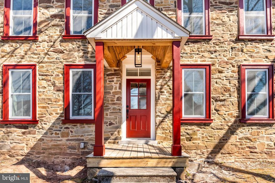 This thoughtfully designed 4-bedroom, 2.5-bathroom stone farmhouse features an inviting open-concept layout, ideal for both family living and entertaining. The first floor welcomes you with a mudroom complete with built-in cubbies, perfect for organizing your everyday essentials. A flexible space with beautiful glass French doors provides the ideal settling for an office, playroom, or whatever suits our lifestyle. The first floor also includes a convenient powder room, adding to the home's functionality.  The heart of the home is the spacious kitchen, which boasts stainless steel appliances and plenty of counter space, making it an ideal space for cooking and gathering. The flows seamlessly into the living and dining areas, creating an open, airy atmosphere.  Throughout the home, deep windows sills add character and charm, enhancing the home's timeless appeal.
The tranquil primary features a private en-suite bathroom for added comfort and convenience. You'll find three additional bedrooms offering ample closet space, providing plenty of room for family, guests or a home office.
Outside your door, Laderach village offers an unbeatable location. Explore local shops, dining spots, and scenic parks, like Bay Pony Inn, Mojo yoga and Wawa Park. The Lederach Golf Club is perfect for golf enthusiasts, and outdoor lovers will enjoy the many parks and trials in the area. With easy access to major transportation routes, Lederach Village combines the best of suburban convenience with a tight-knit community atmosphere. Don't miss the opportunity to make this charming home your own .