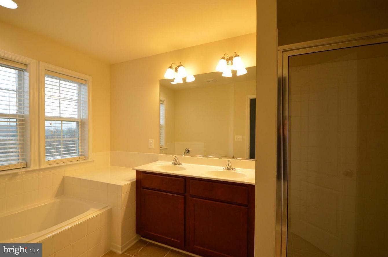 THE TOWNES AT TASKER - Residential Lease